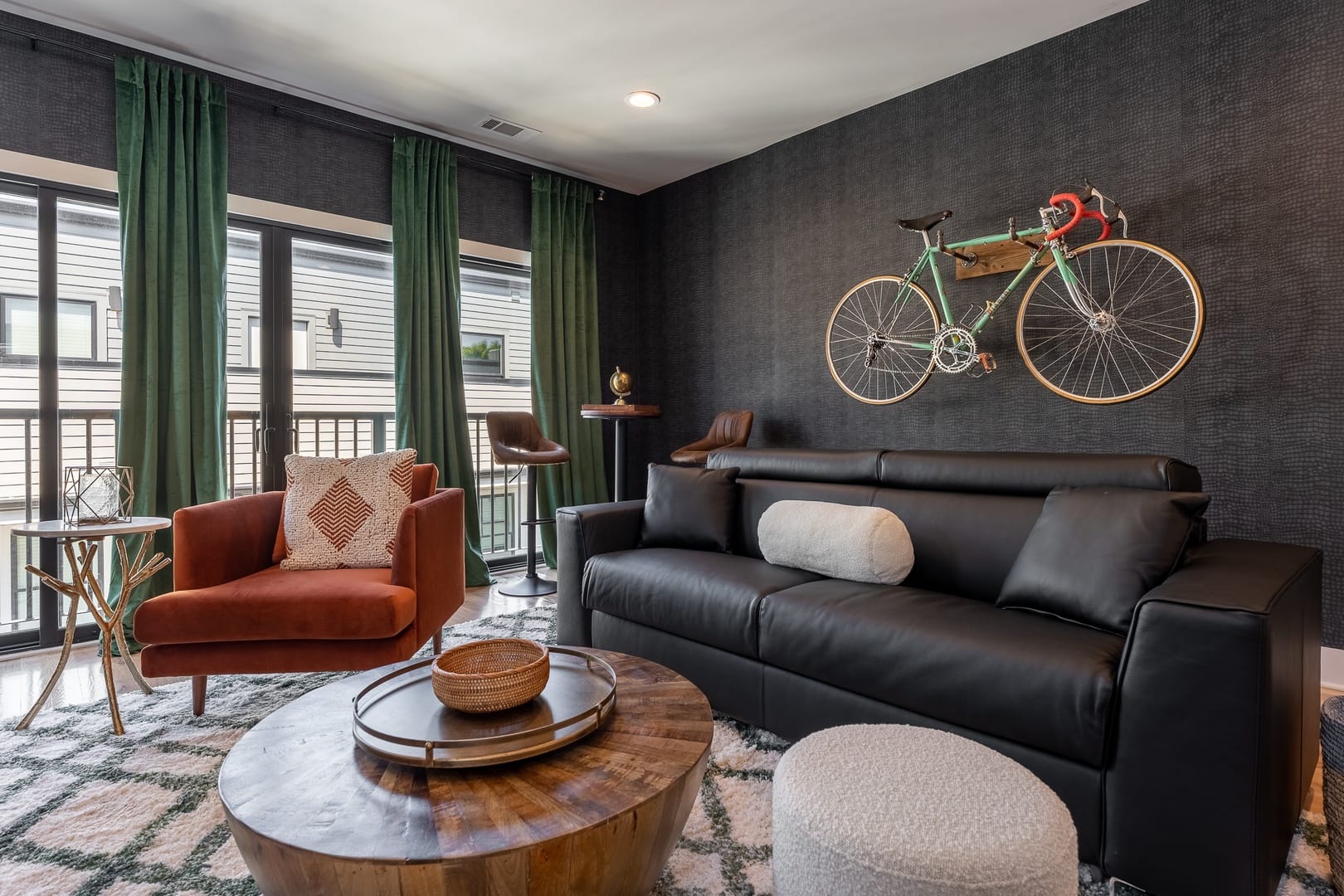 Modern living room with hanging bicycle.