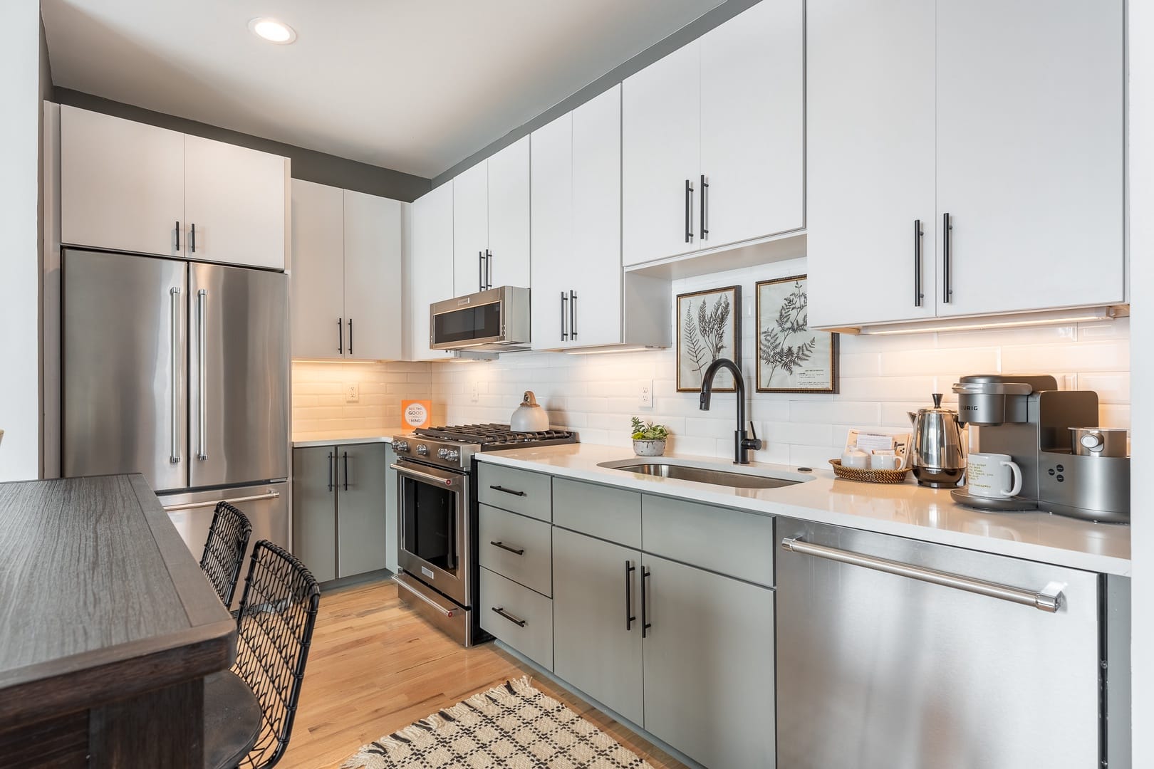 Modern kitchen with stainless steel appliances.