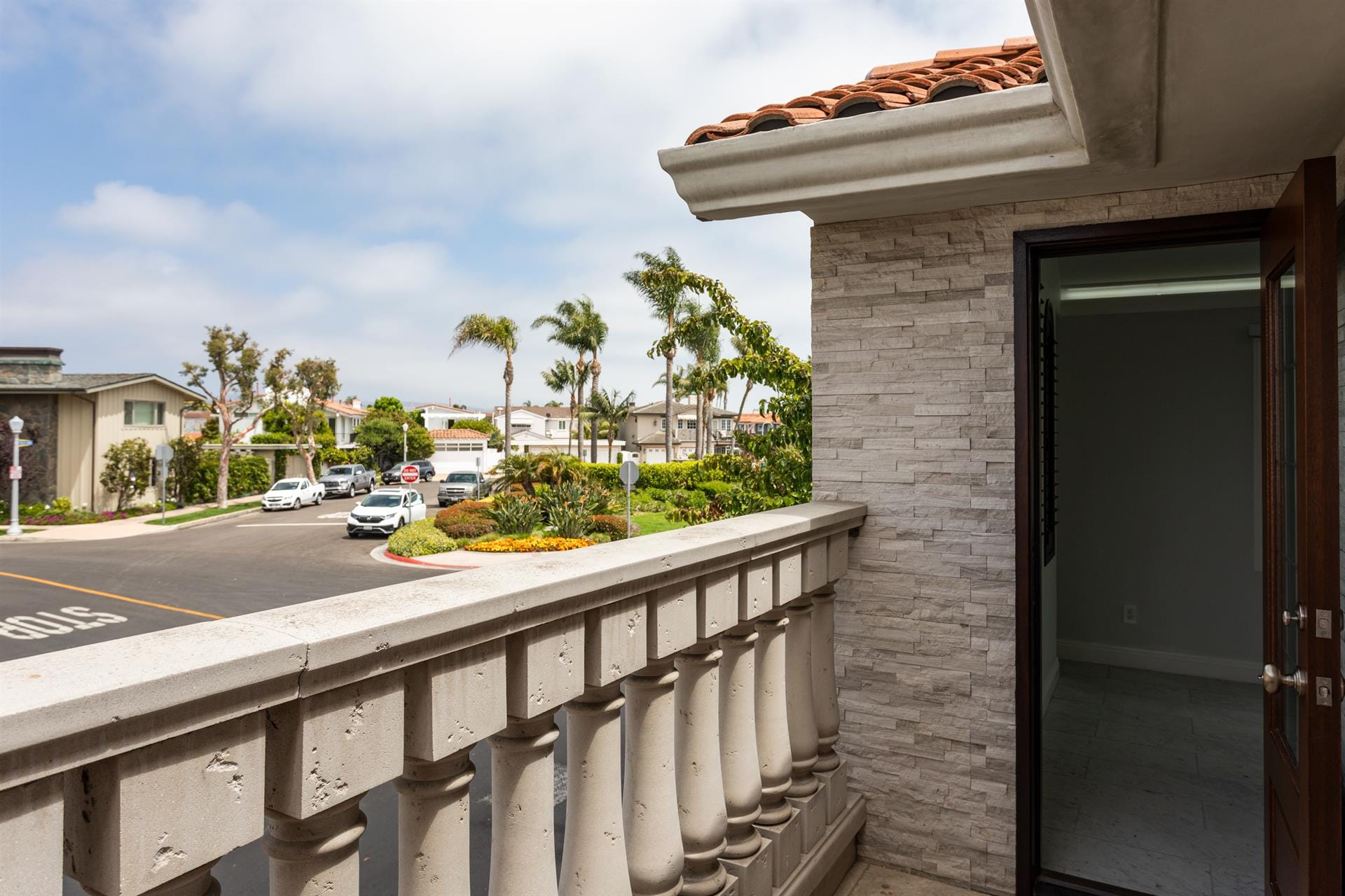 Balcony view of suburban street.