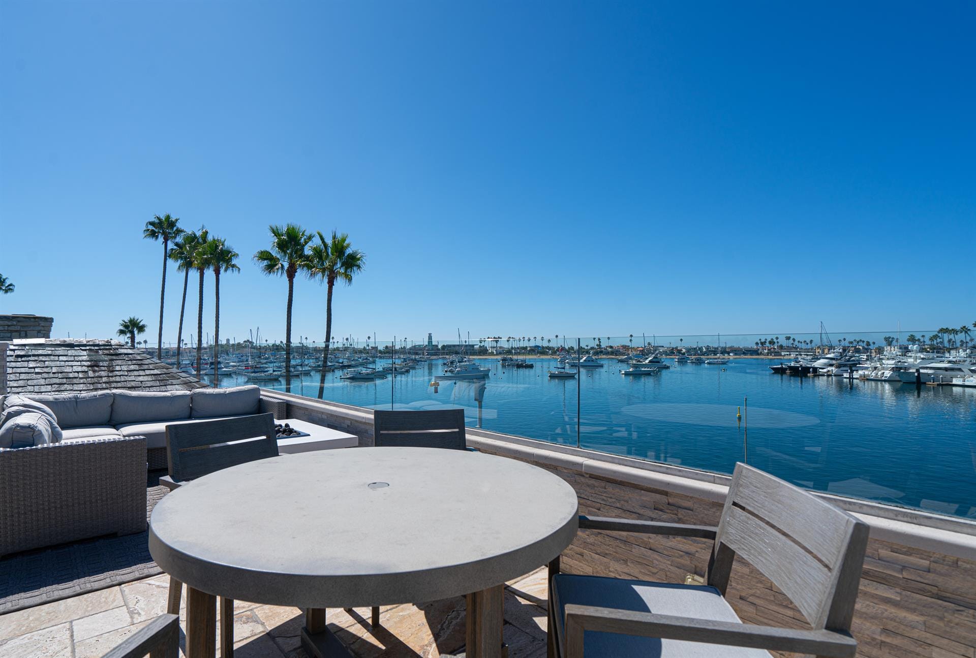 Marina view with outdoor seating.