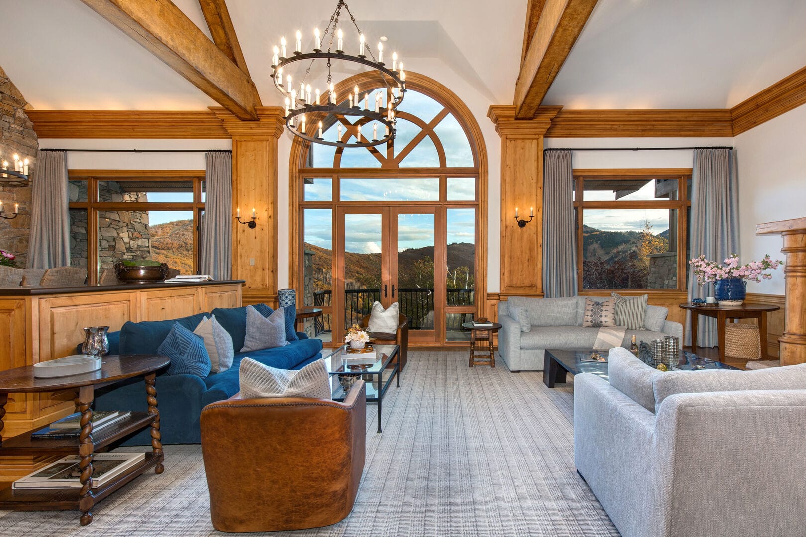 Rustic living room with mountain view.