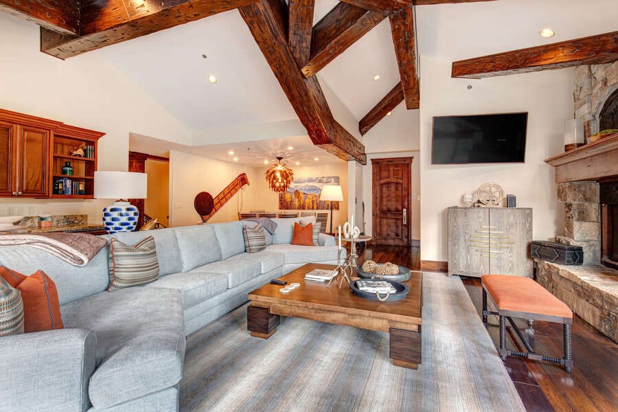 Rustic living room with exposed beams.