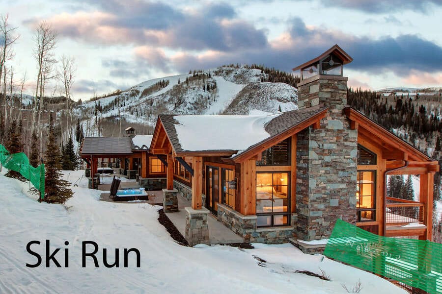 Mountain cabin beside ski run.