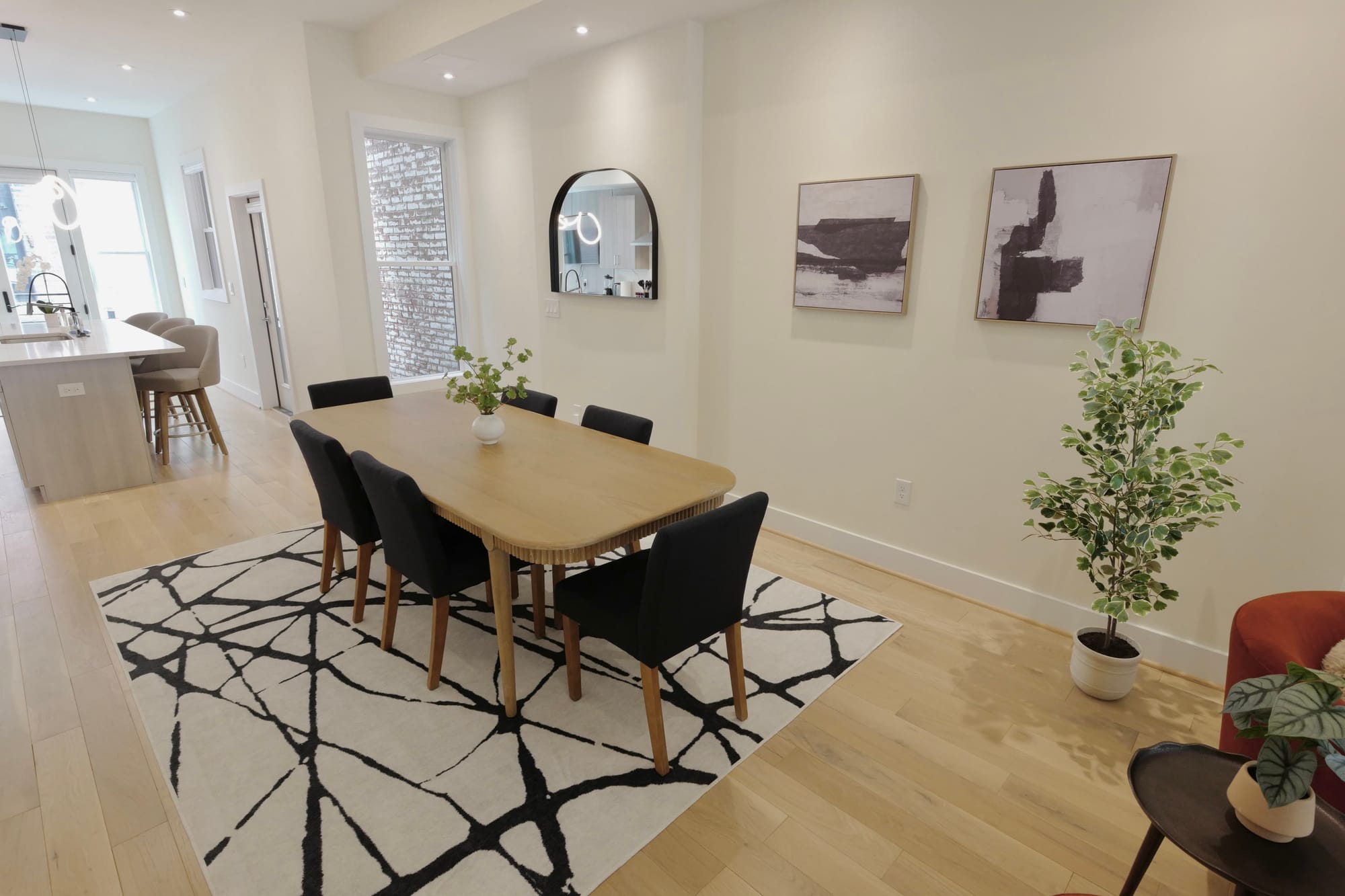 Modern dining room with minimalist decor.