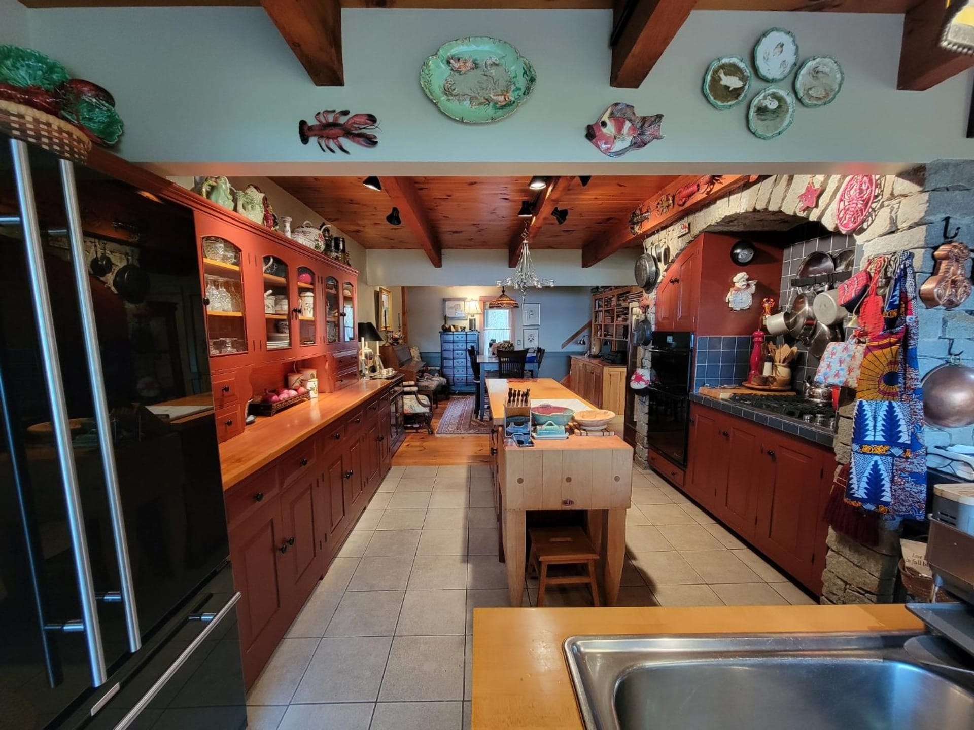 Rustic kitchen with wooden cabinetry.