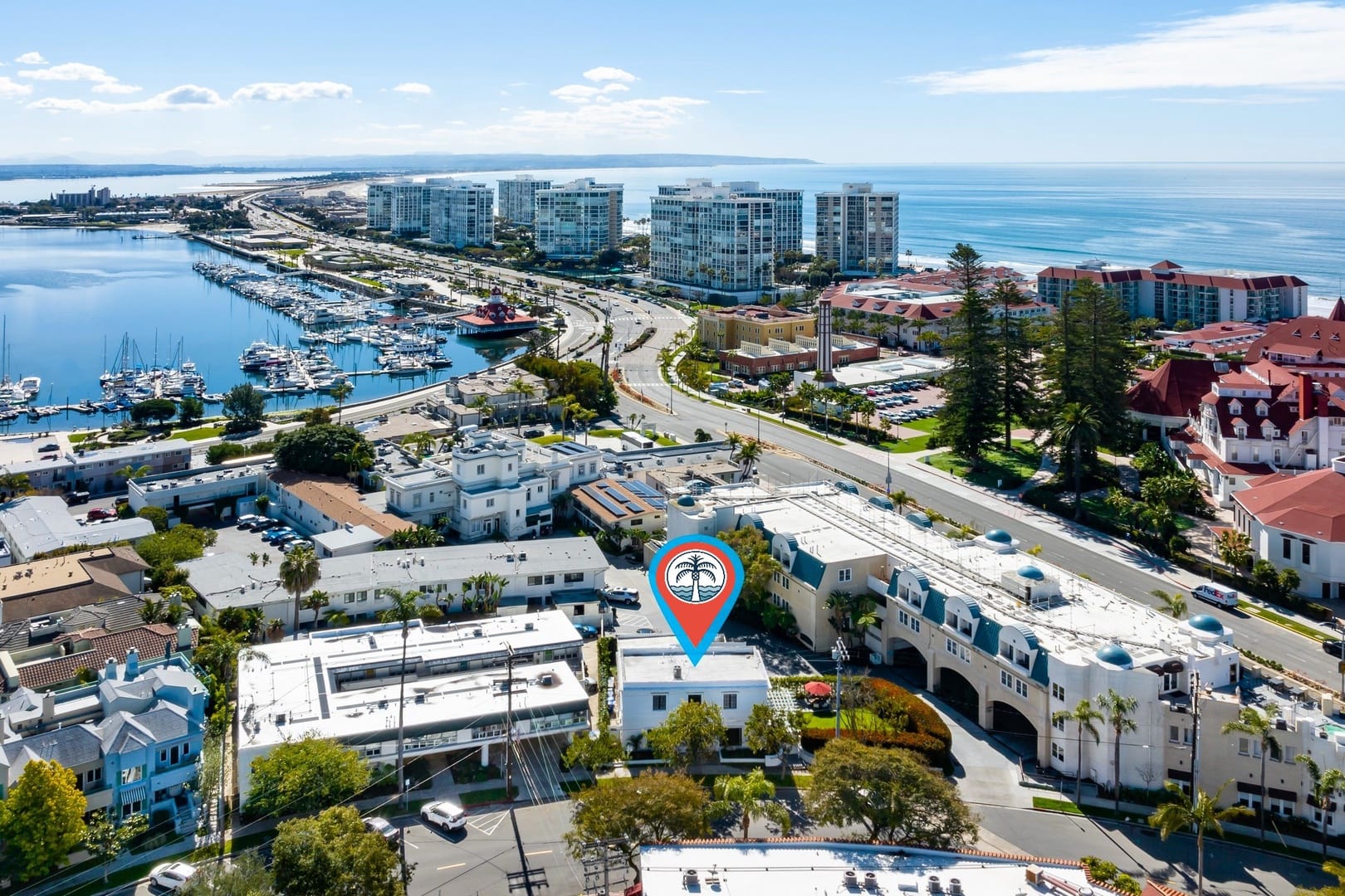 Coastal city aerial view with marina.