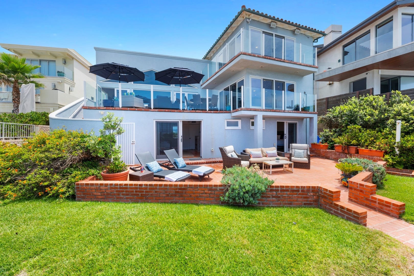 Modern house with patio furniture.