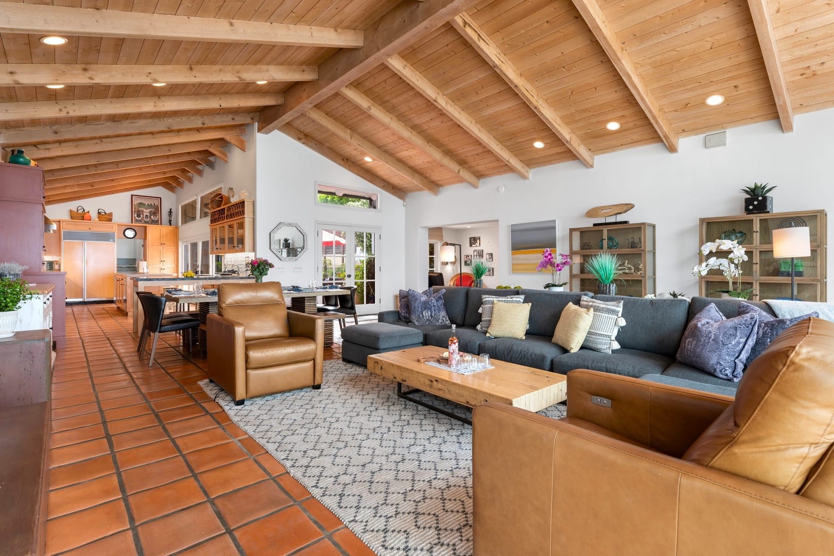 Modern living room with wooden ceiling.