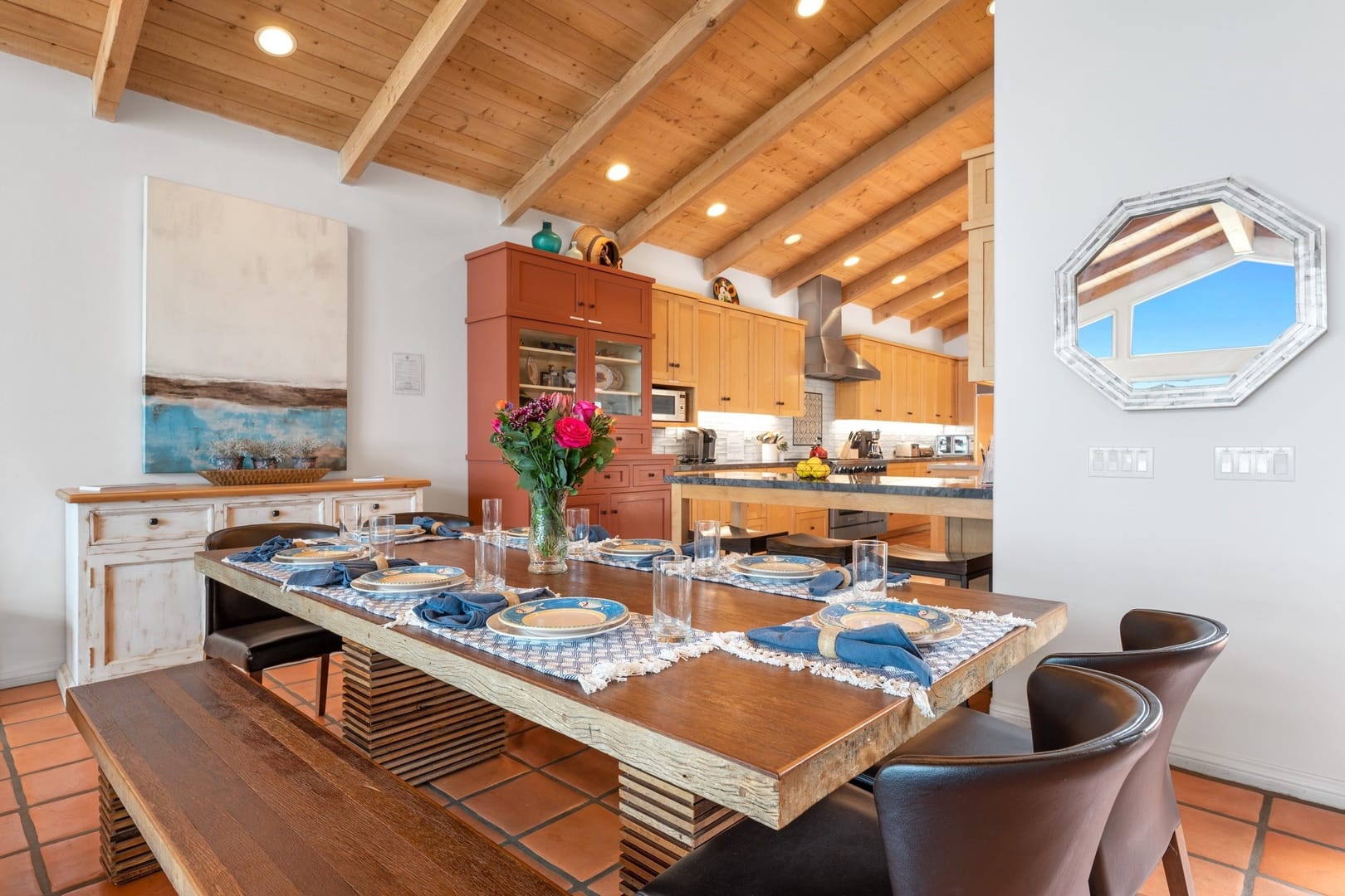 Modern kitchen and dining table setup.