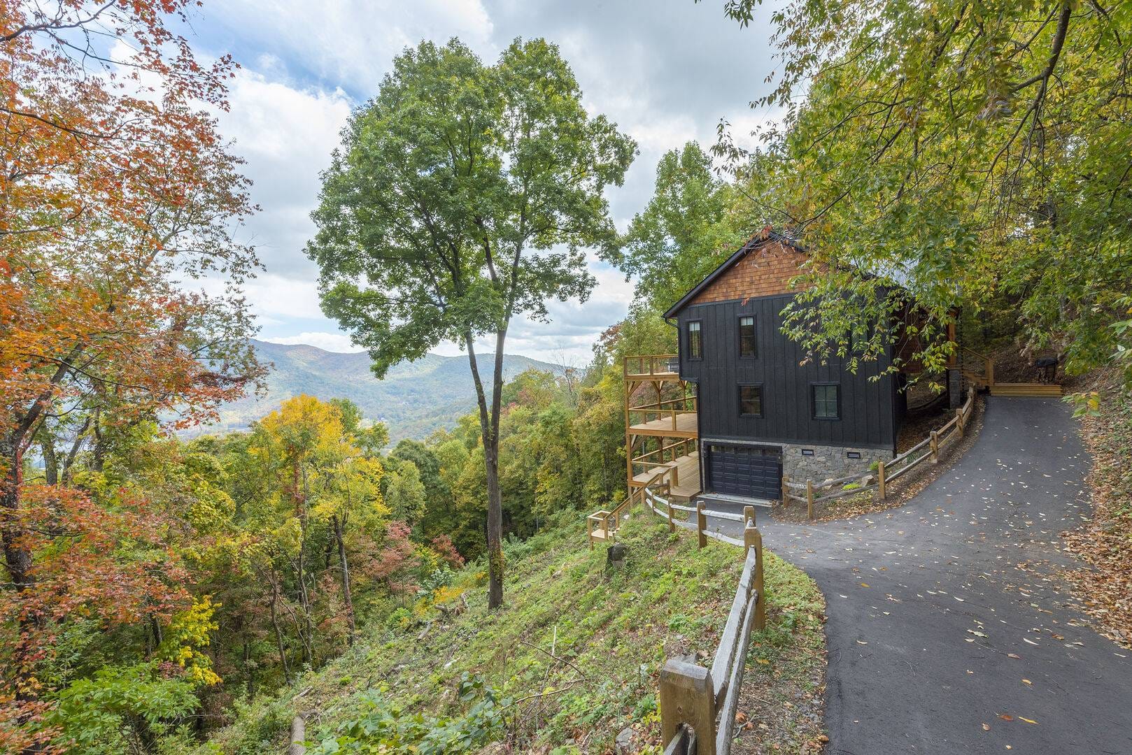 House on forested mountain slope.