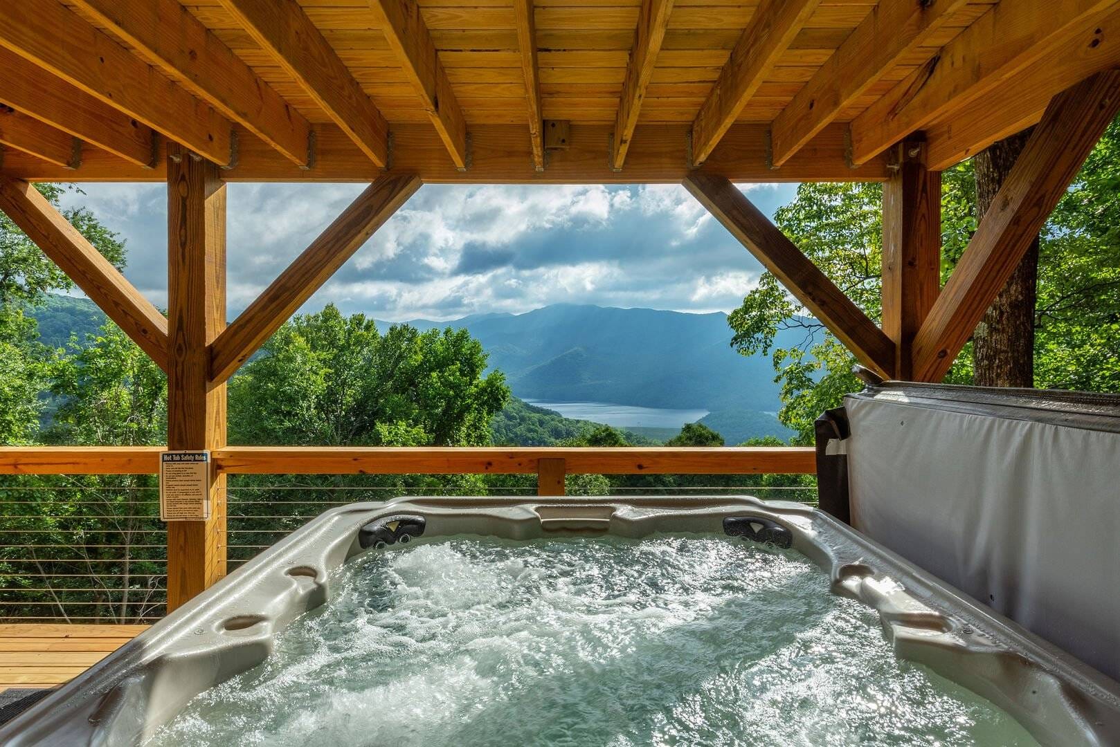 Hot tub with scenic mountain view