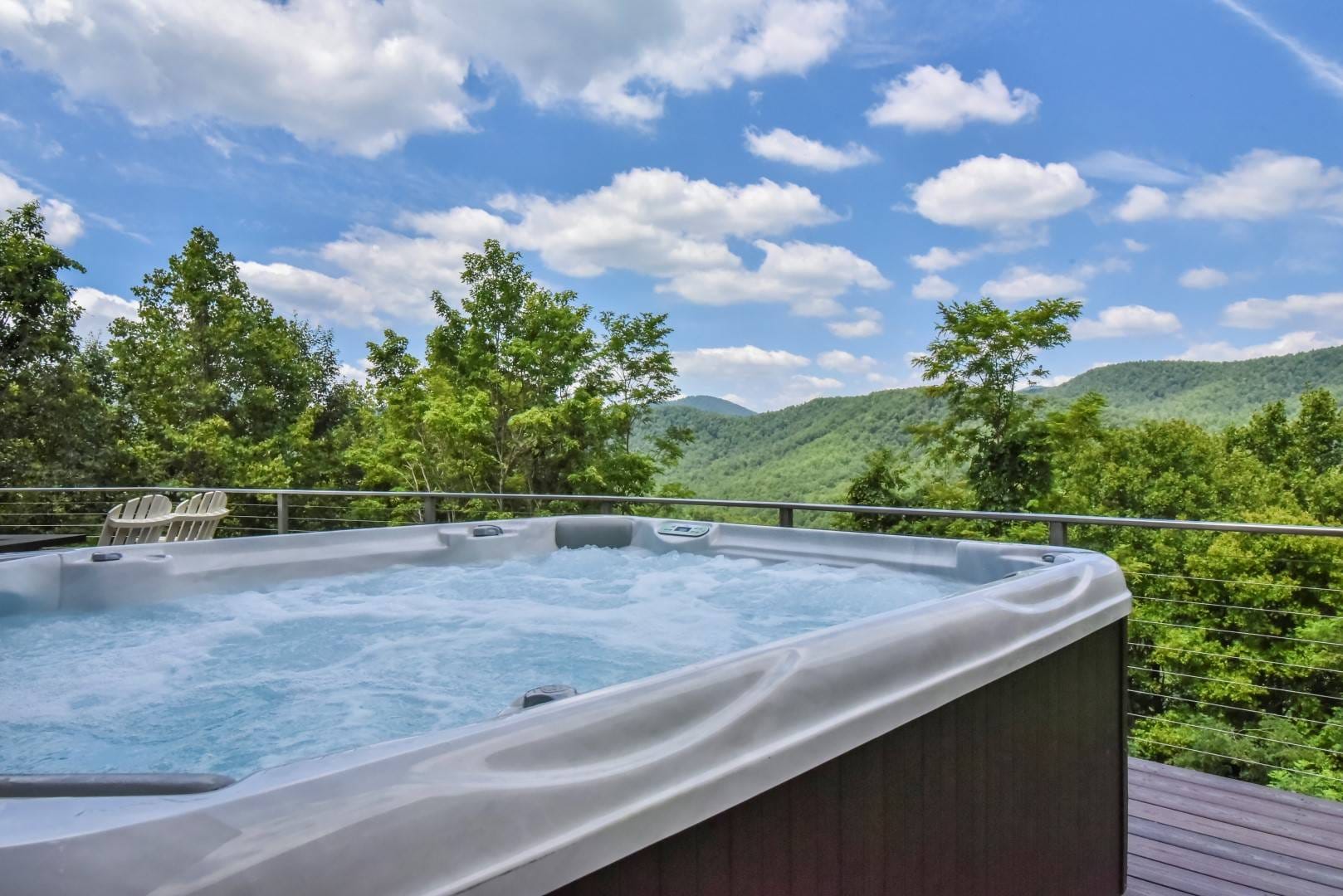 Hot tub on mountain view deck.