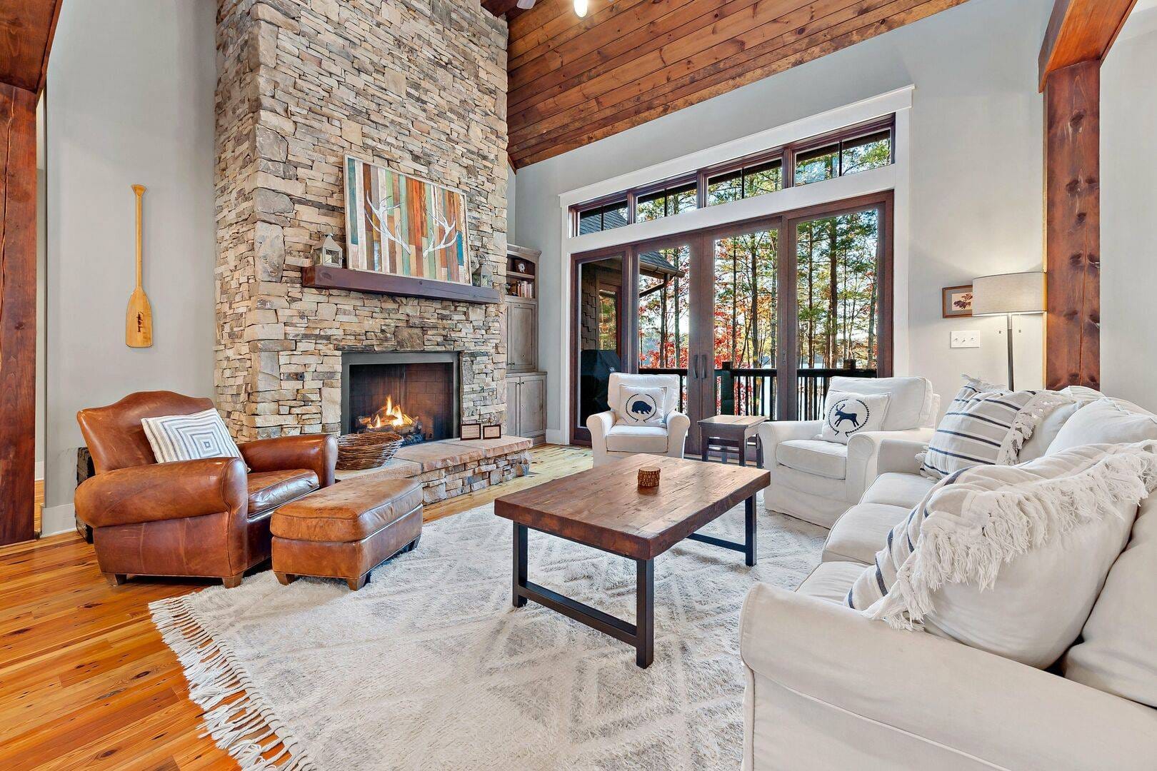 Cozy living room with stone fireplace.