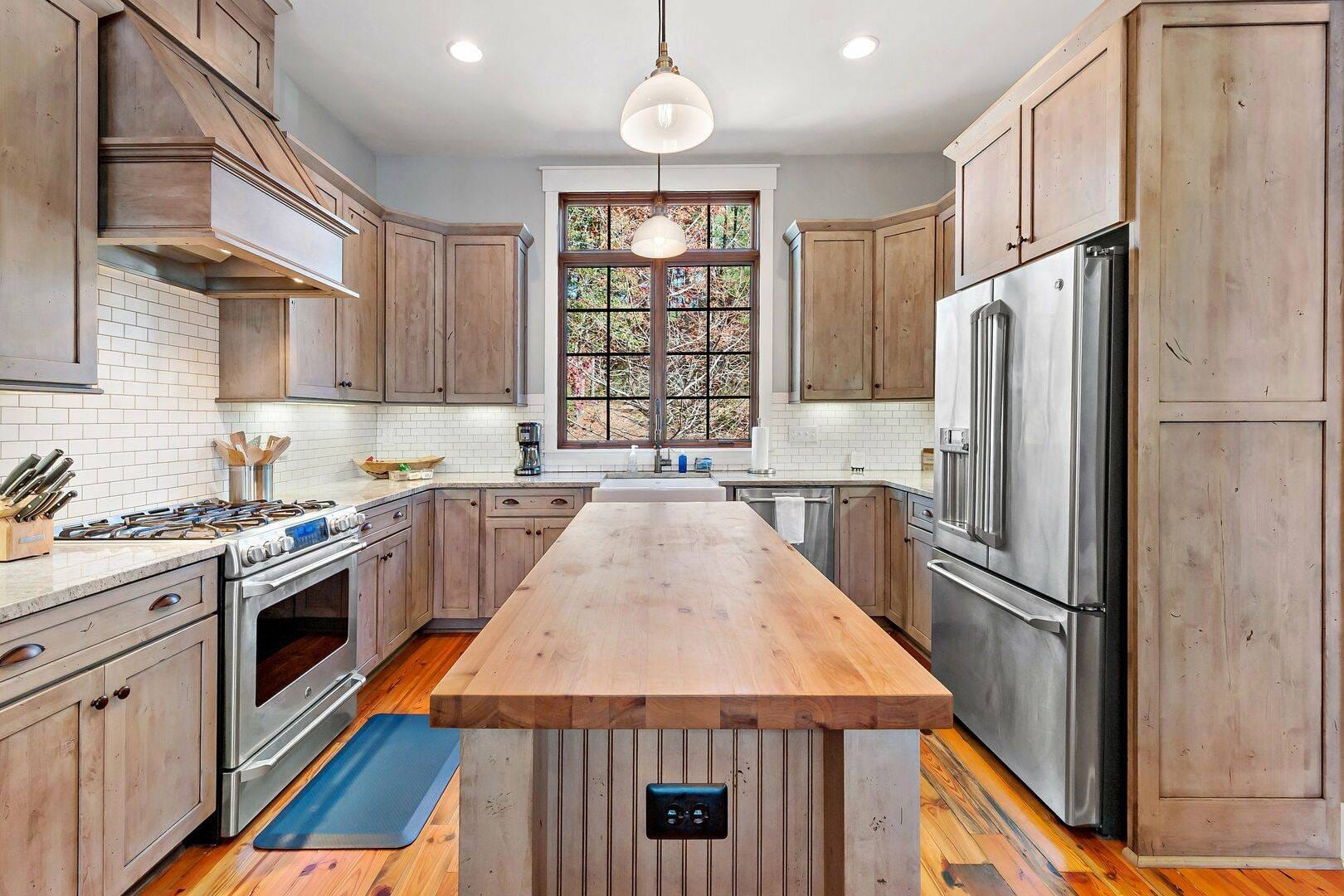 Rustic kitchen with wooden cabinets.