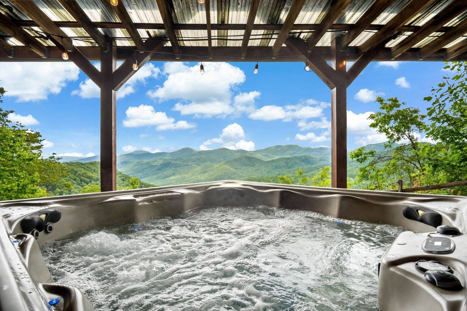 Hot tub with mountain view.