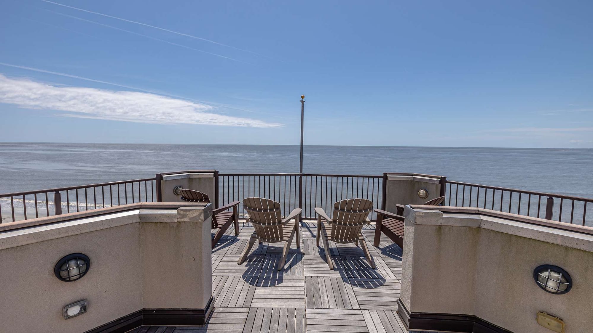 Deck chairs overlooking the ocean.