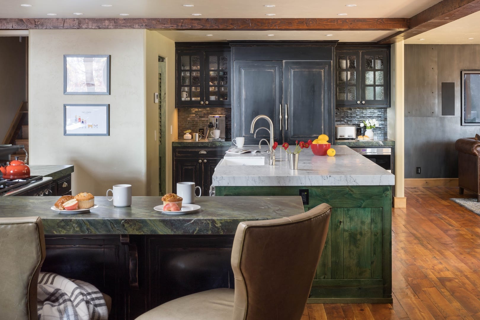 Modern kitchen with dark cabinetry.