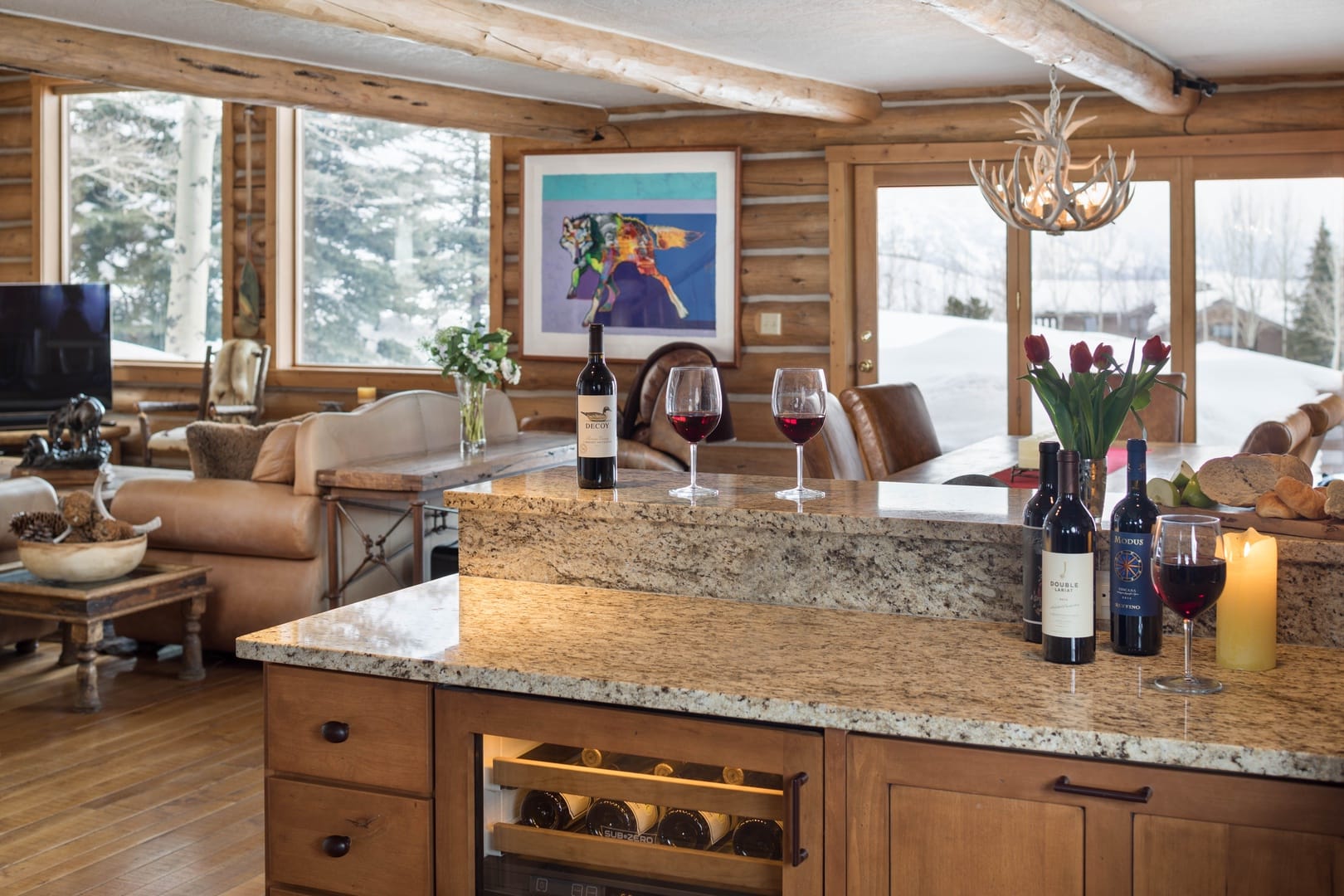 Cozy cabin kitchen with wine.