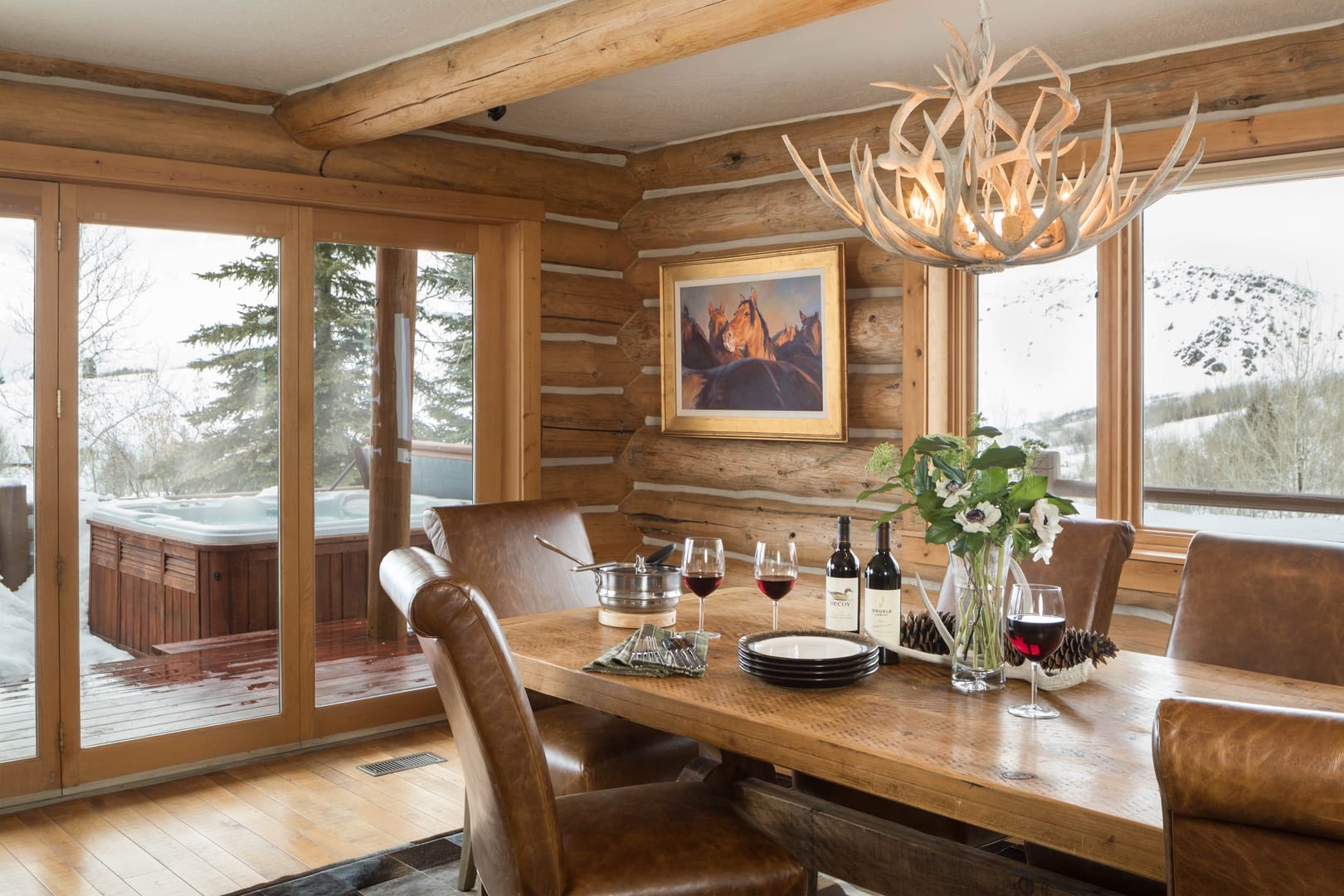 Rustic dining room with mountain view.