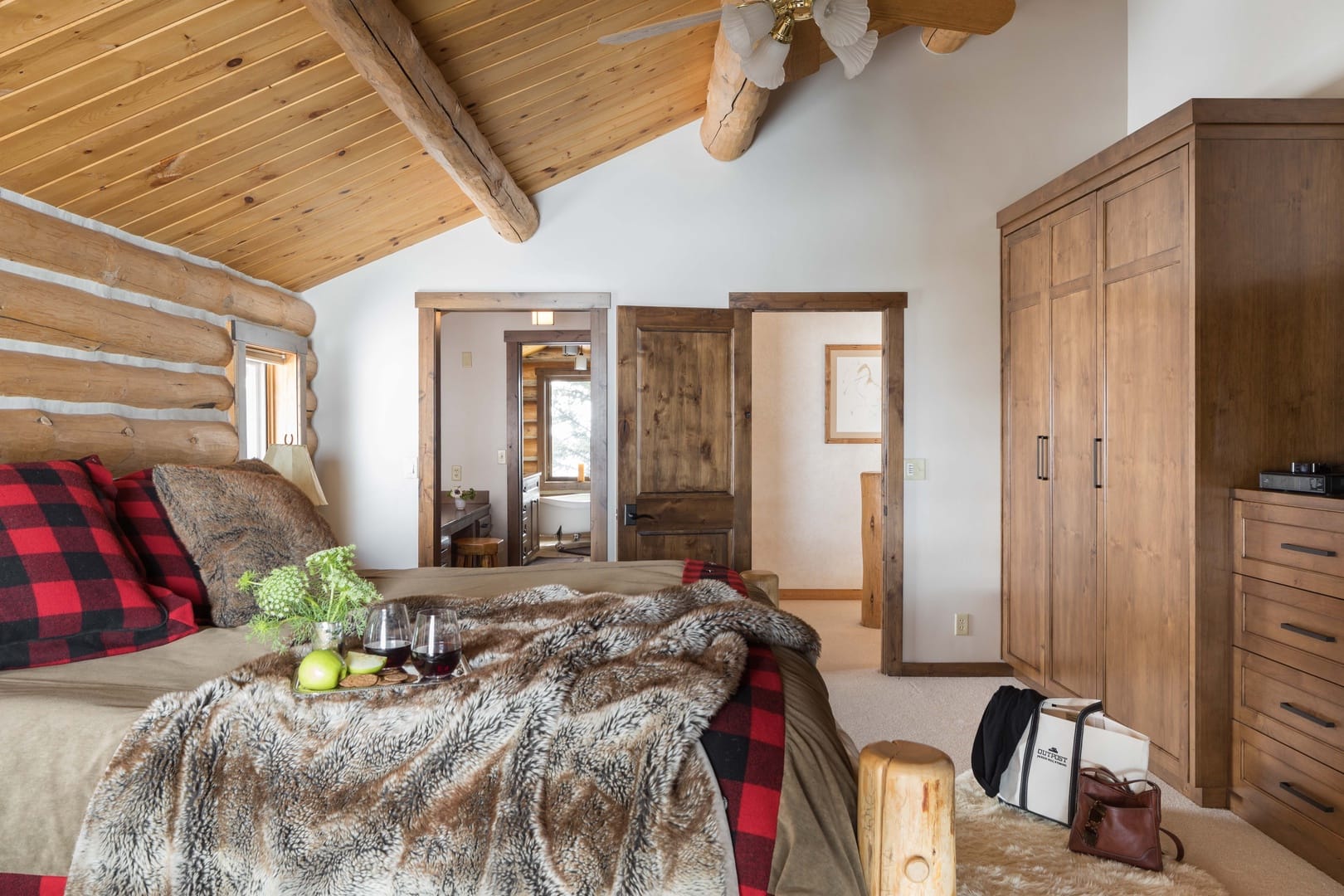 Cozy rustic bedroom with wooden decor.