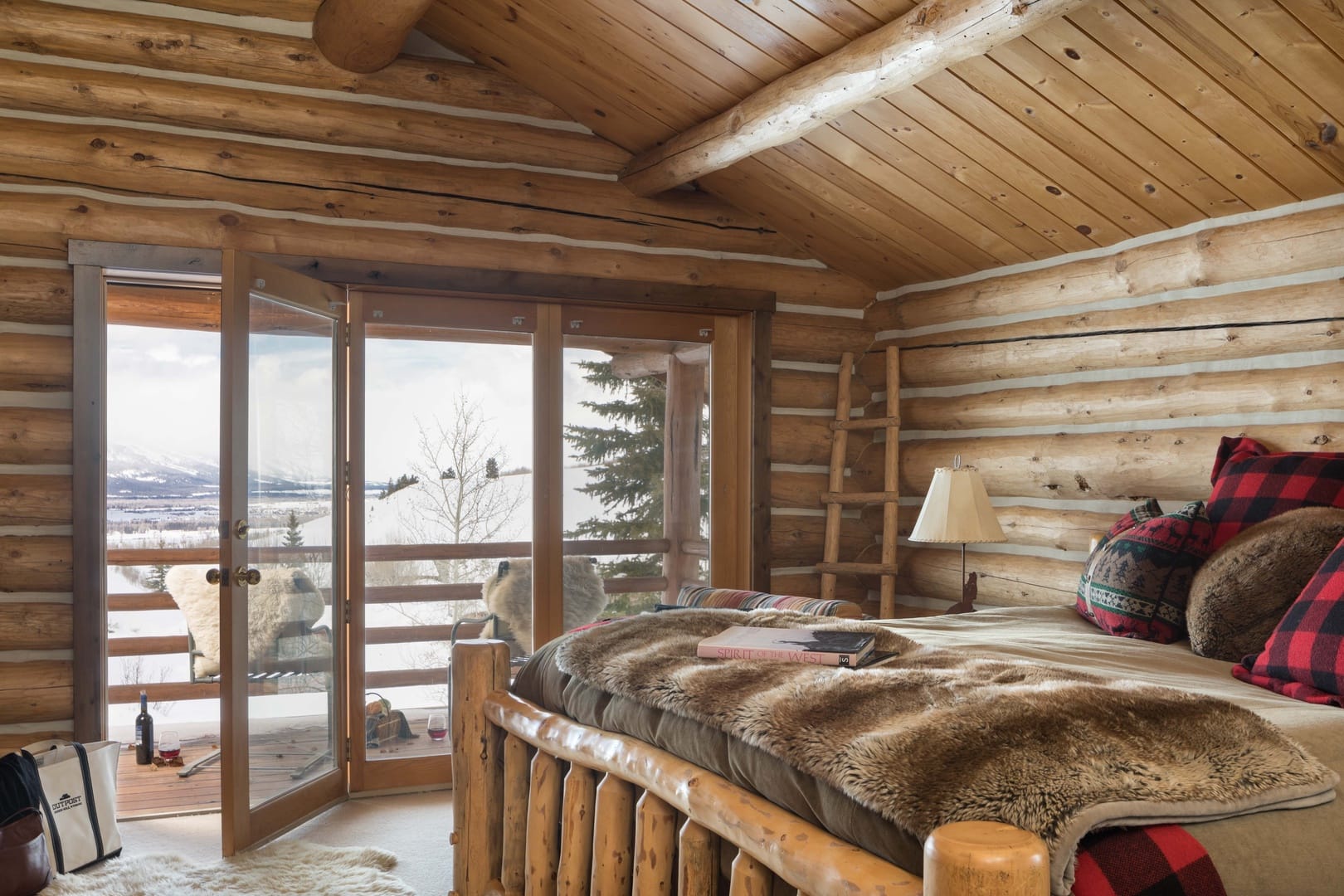 Cozy rustic cabin bedroom view.