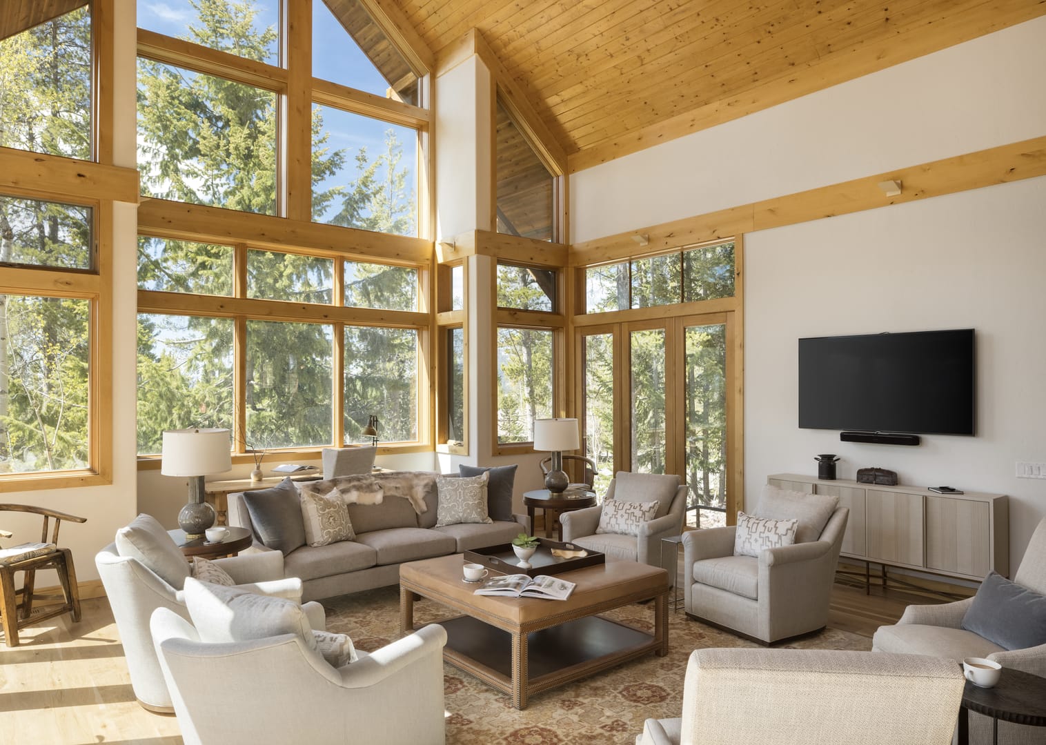 Modern living room with large windows.