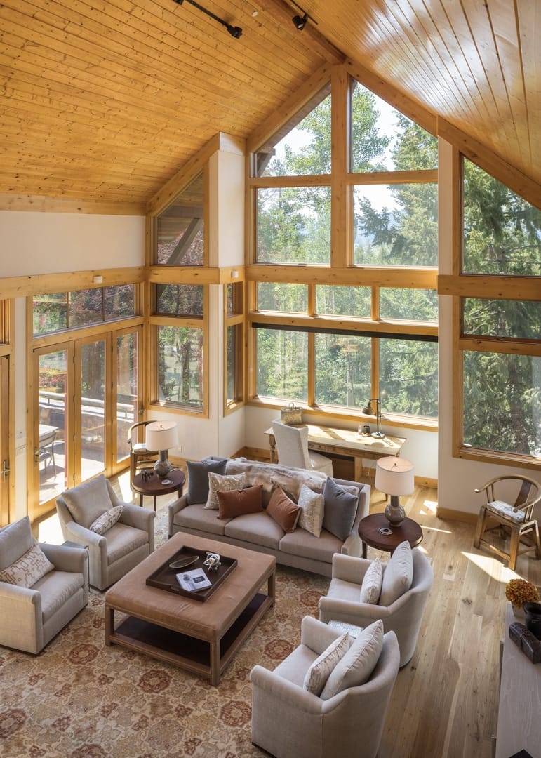 Spacious living room with large windows.