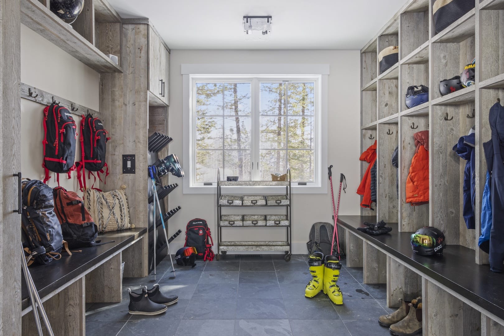 Organized ski gear storage room.