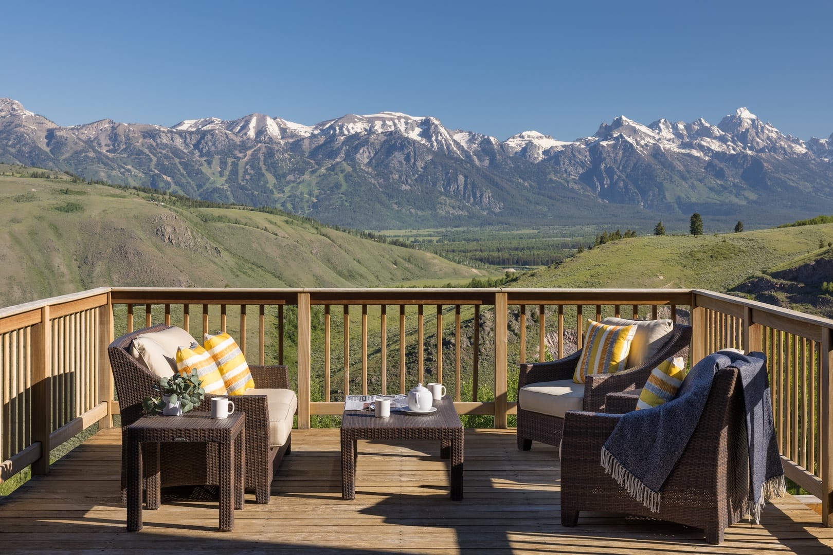 Deck with mountains in background.