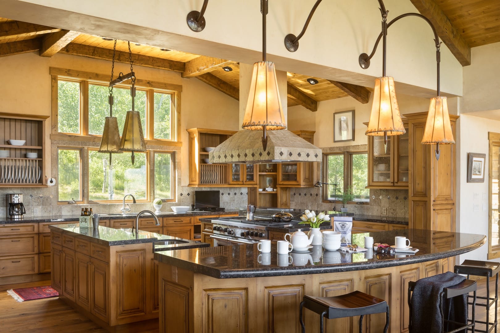 Rustic kitchen with large windows.