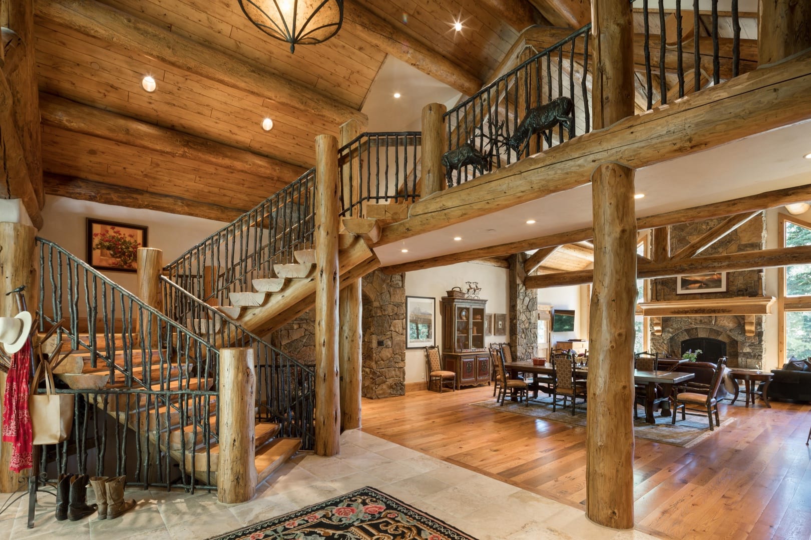 Rustic wooden cabin interior, staircase.