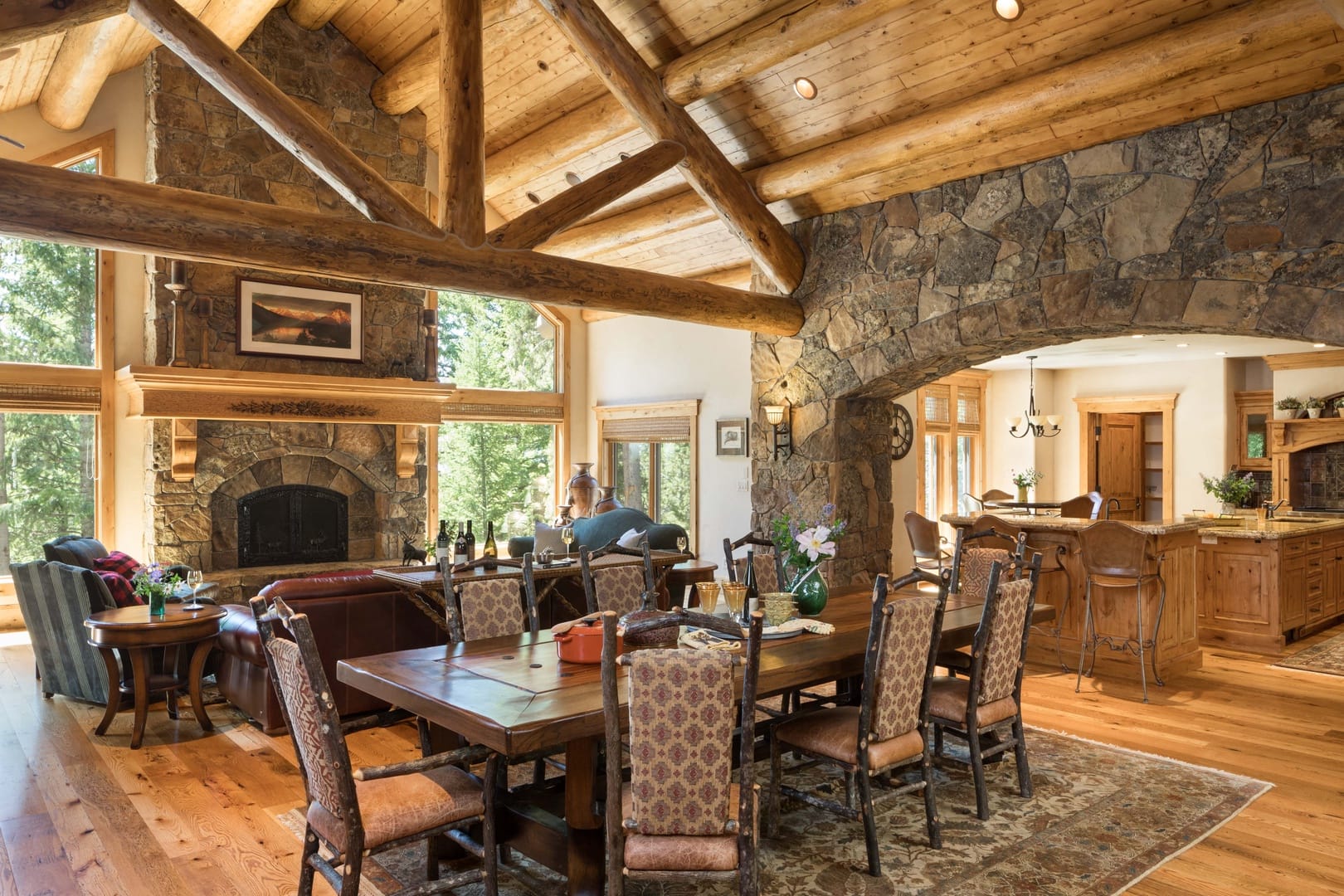 Rustic cabin interior with dining area.