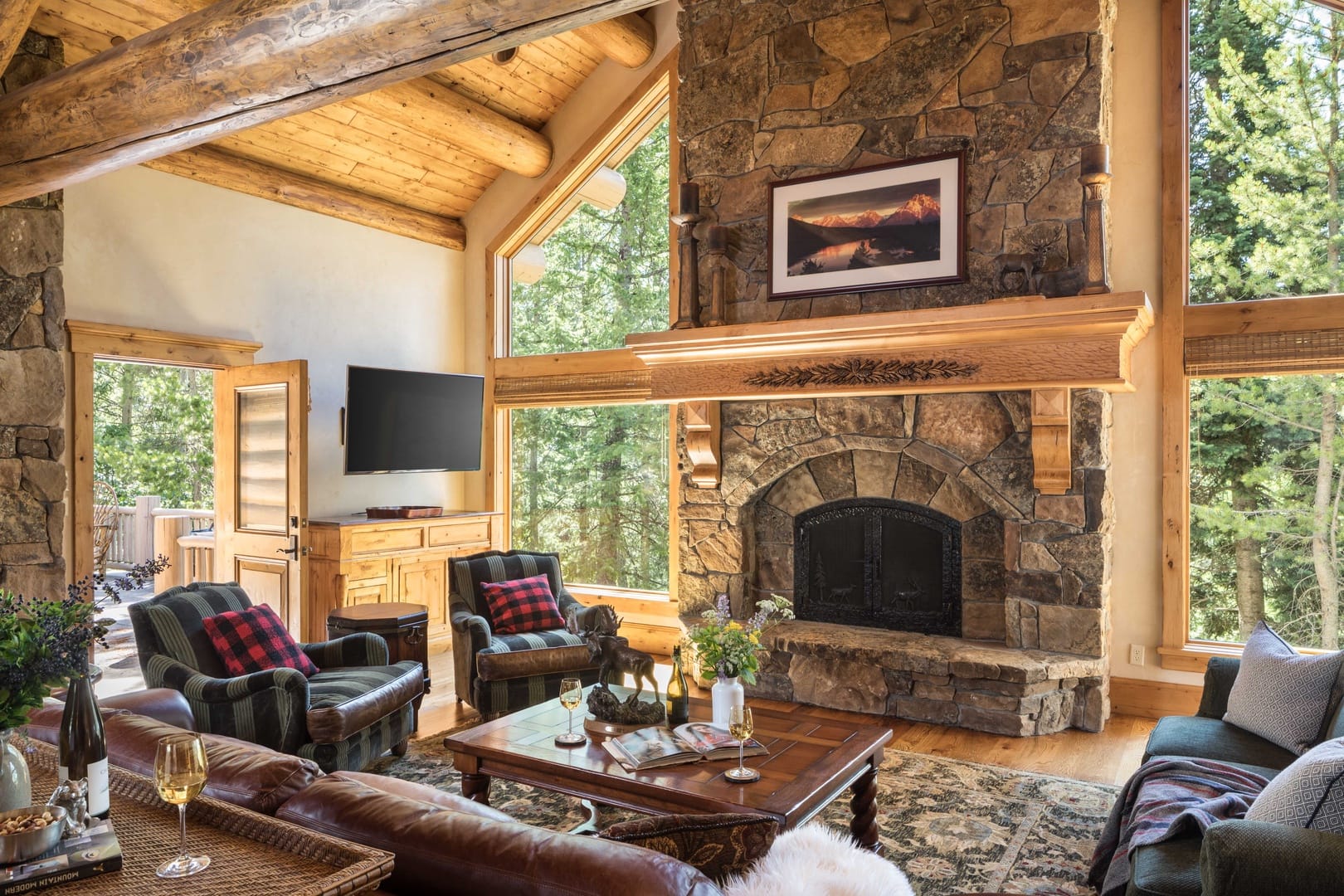 Cozy cabin with stone fireplace.