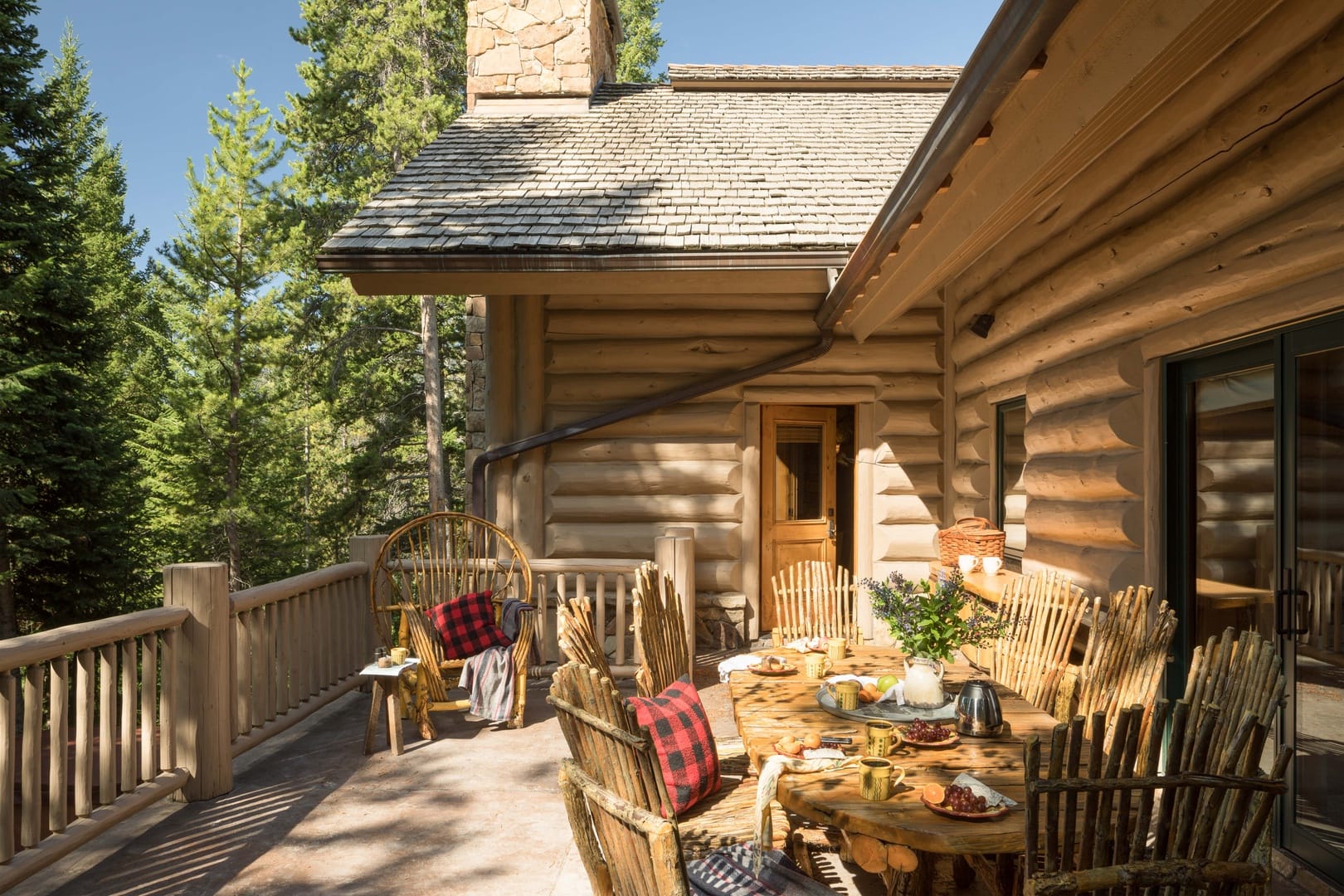 Rustic patio with wooden furniture.