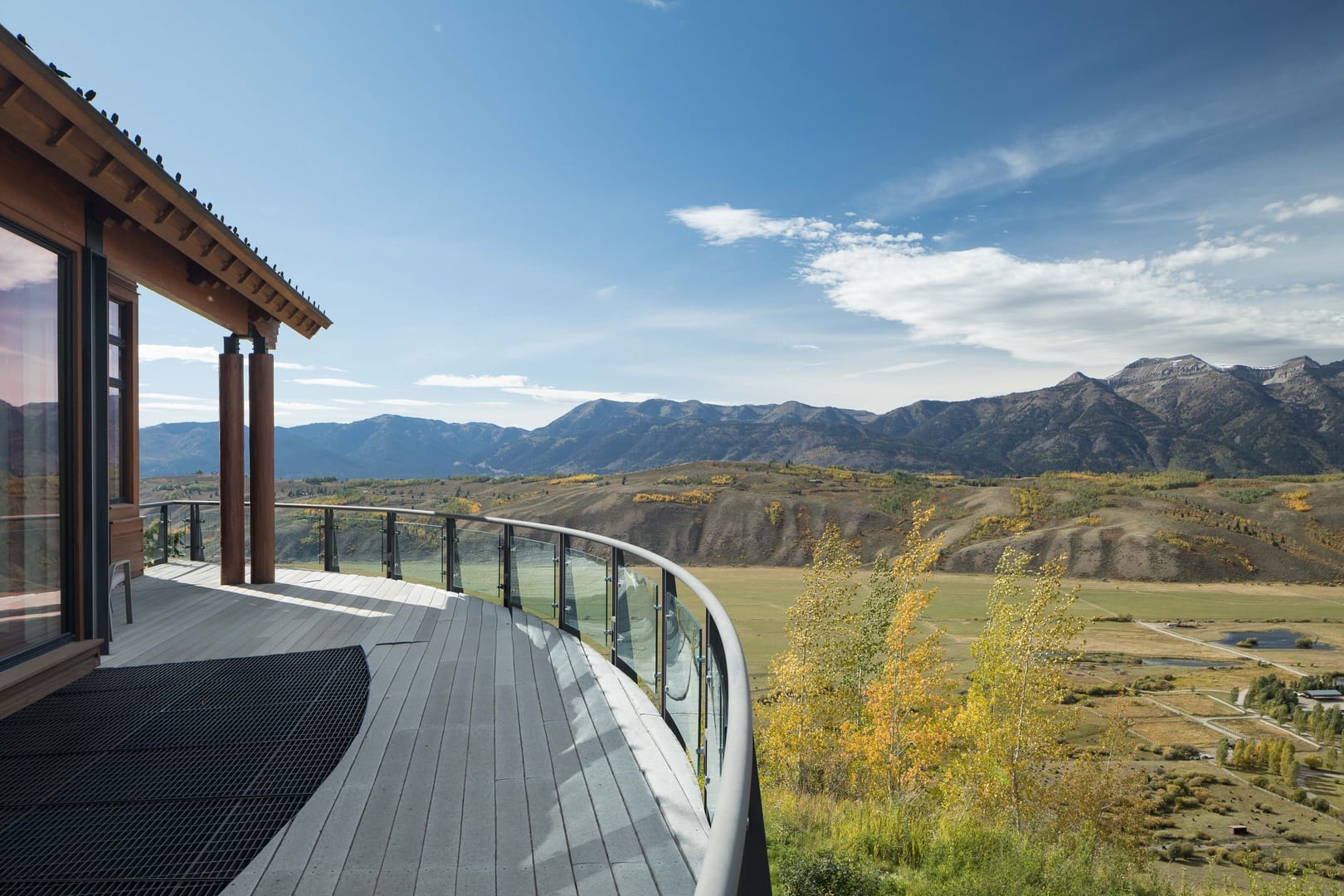 Mountain view from curved balcony.