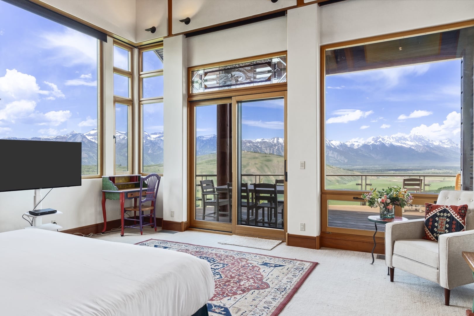 Luxurious bedroom with mountain view.