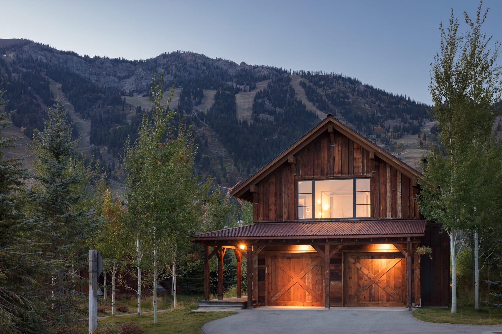 Cabin house with mountain background.