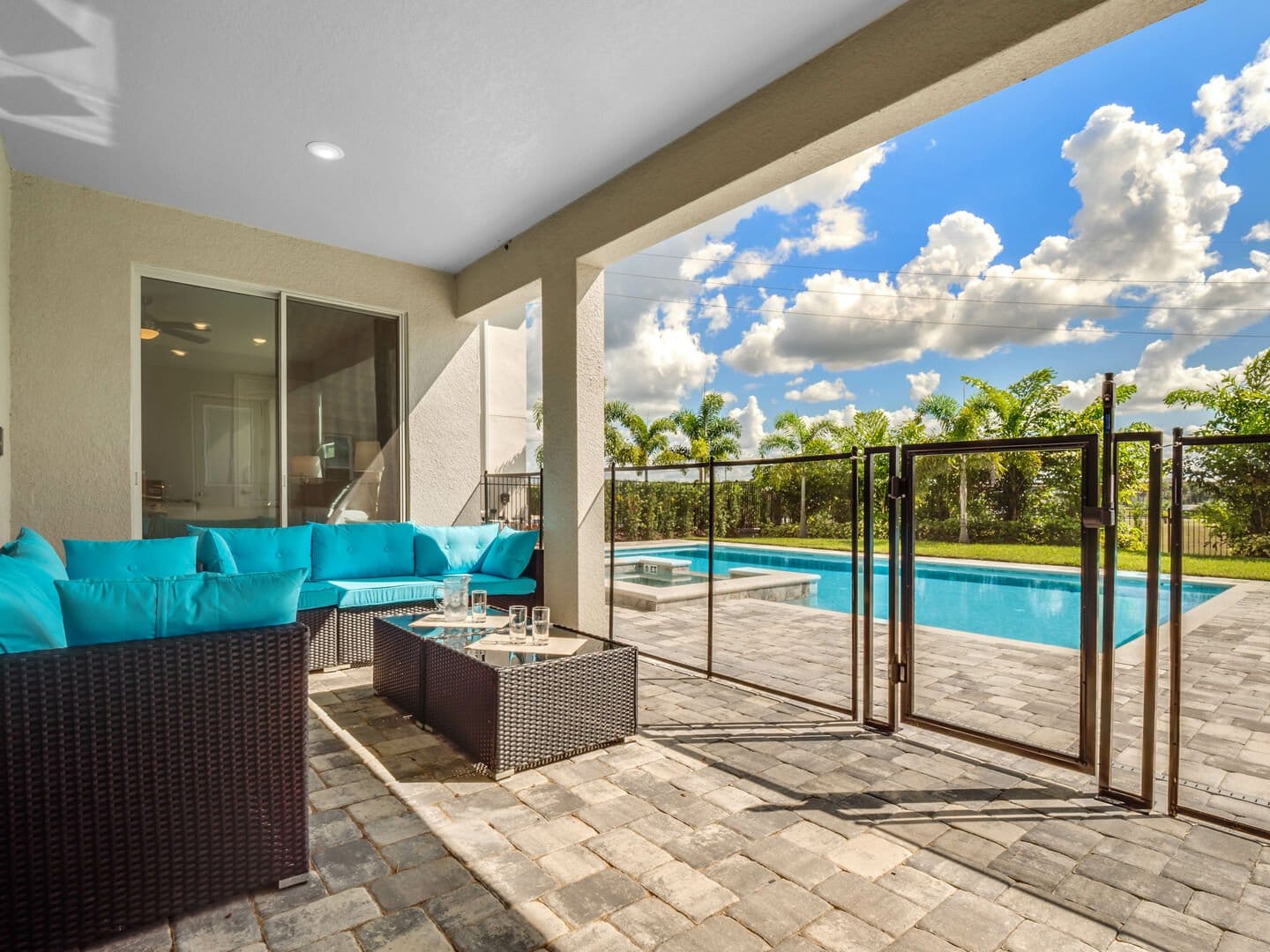 Patio with pool and seating.