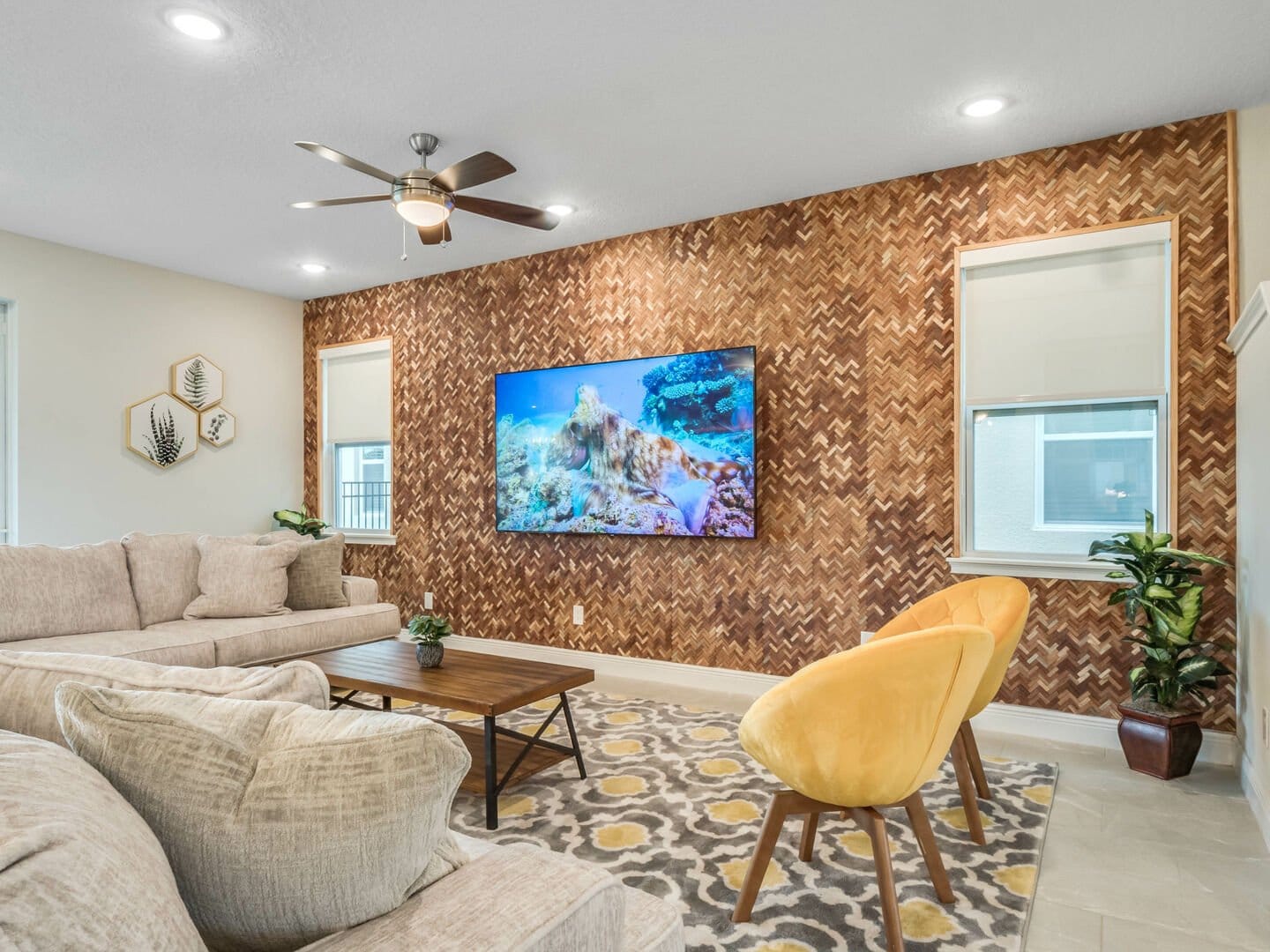 Modern living room with patterned wall.