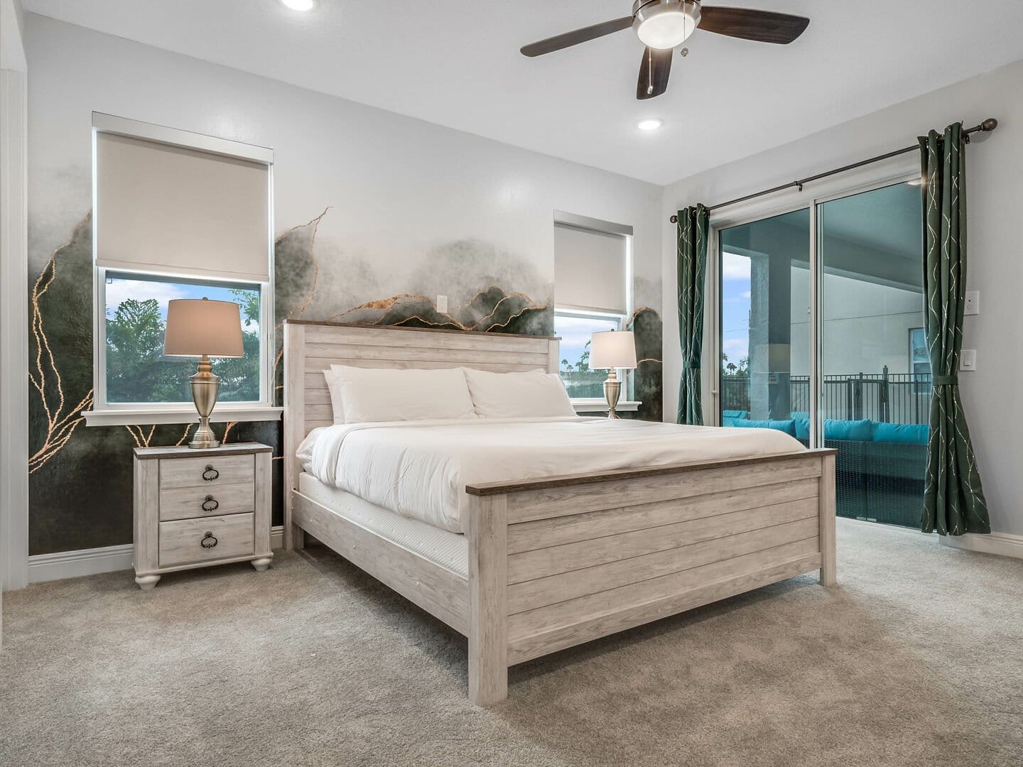 Modern bedroom with large windows.