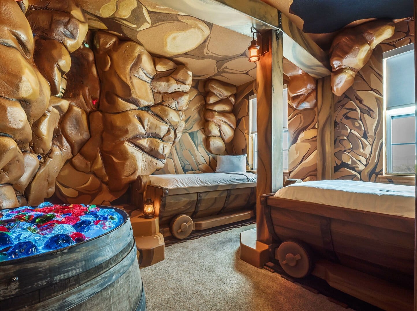 Cave-themed bedroom with minecarts.