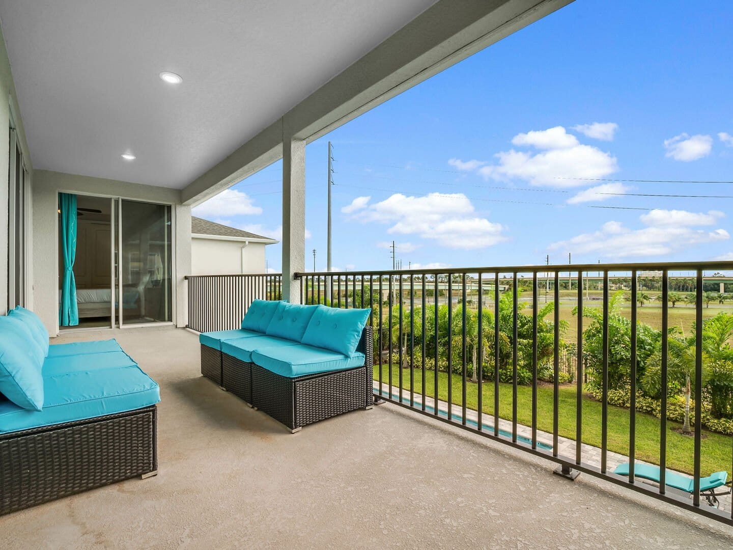 Balcony with seating and greenery