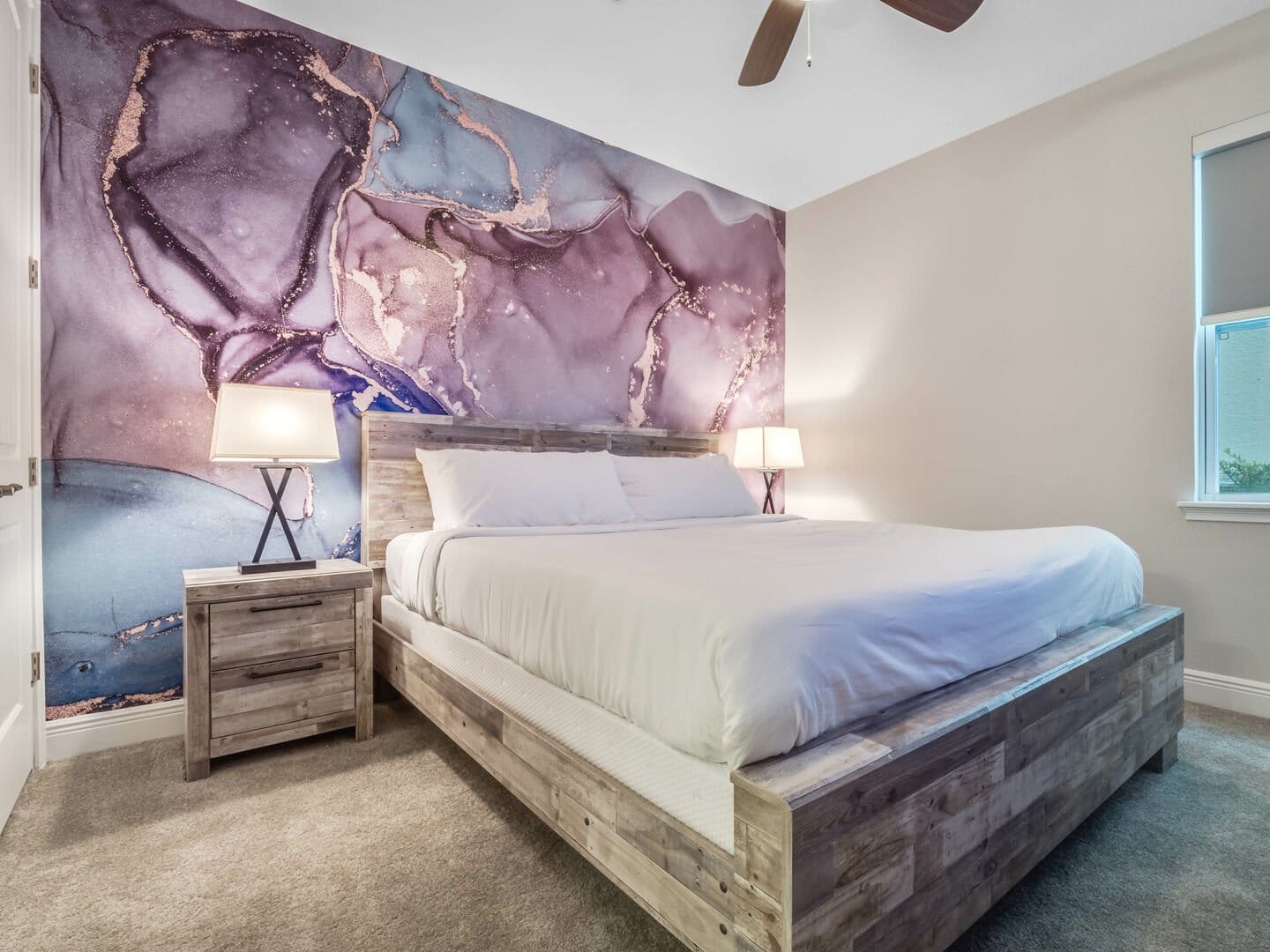 Bedroom with abstract mural wall