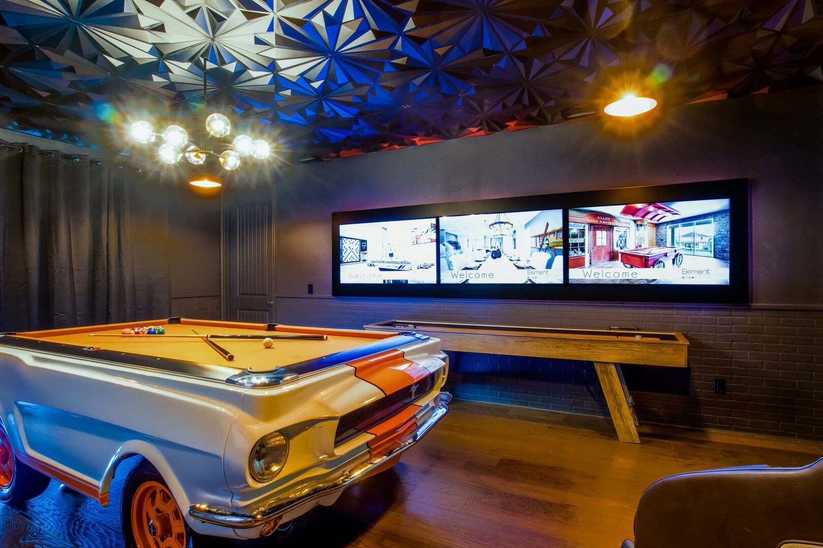 Car-themed pool table and decorations.