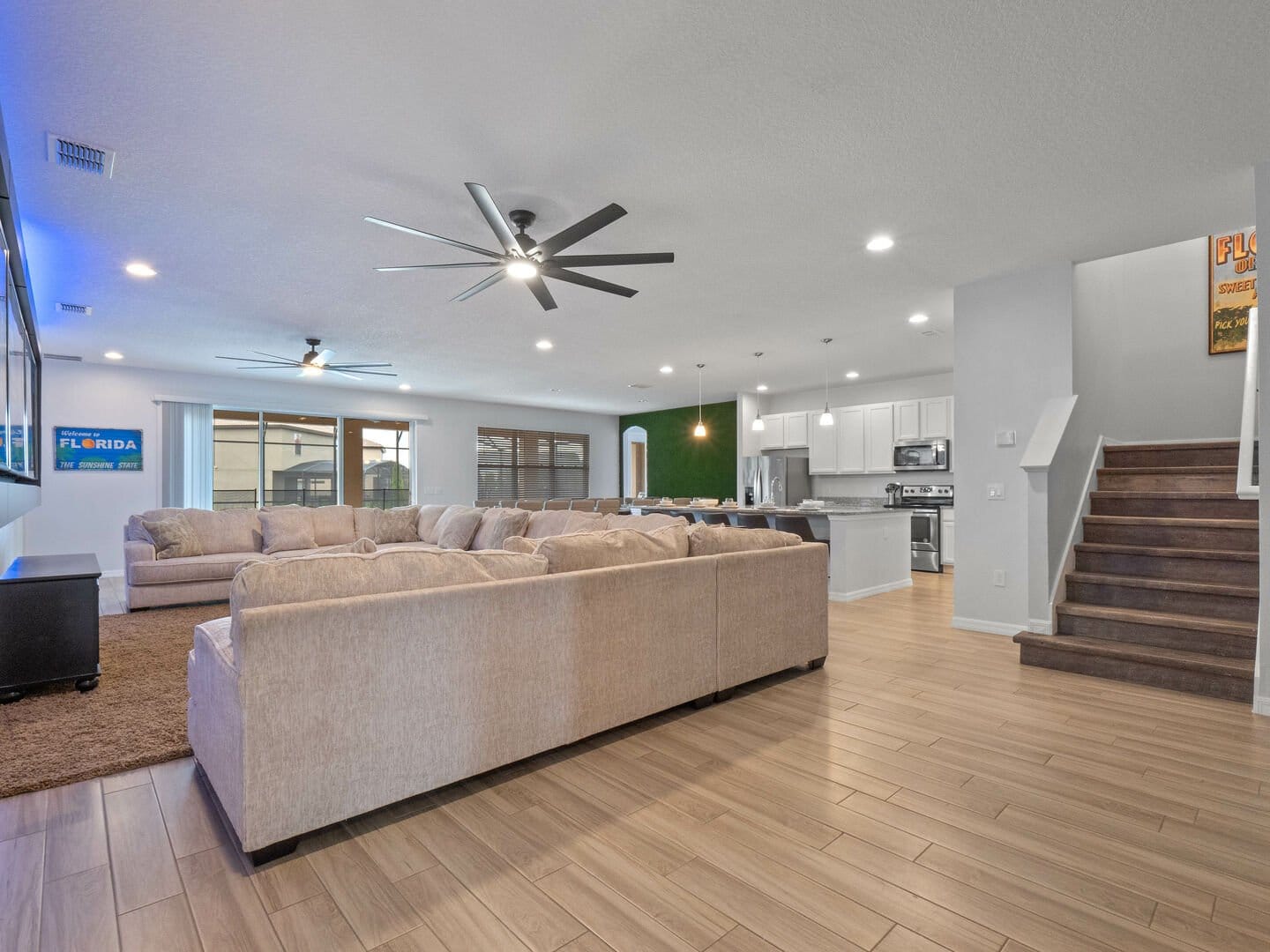 Spacious living room and kitchen area.