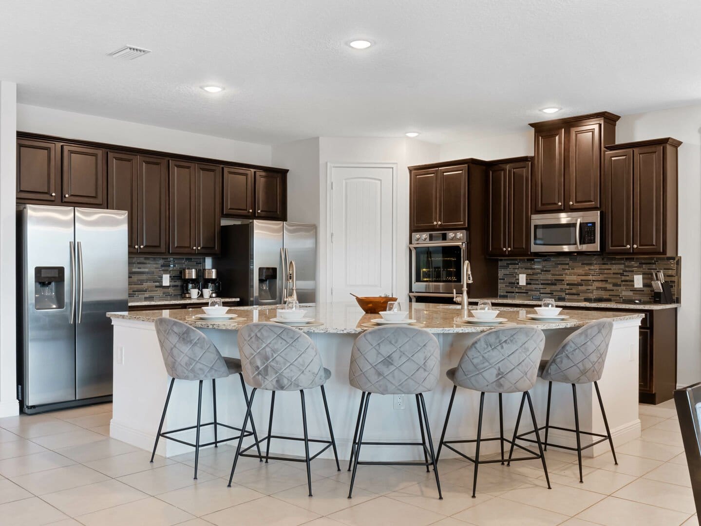 Modern kitchen with island seating.