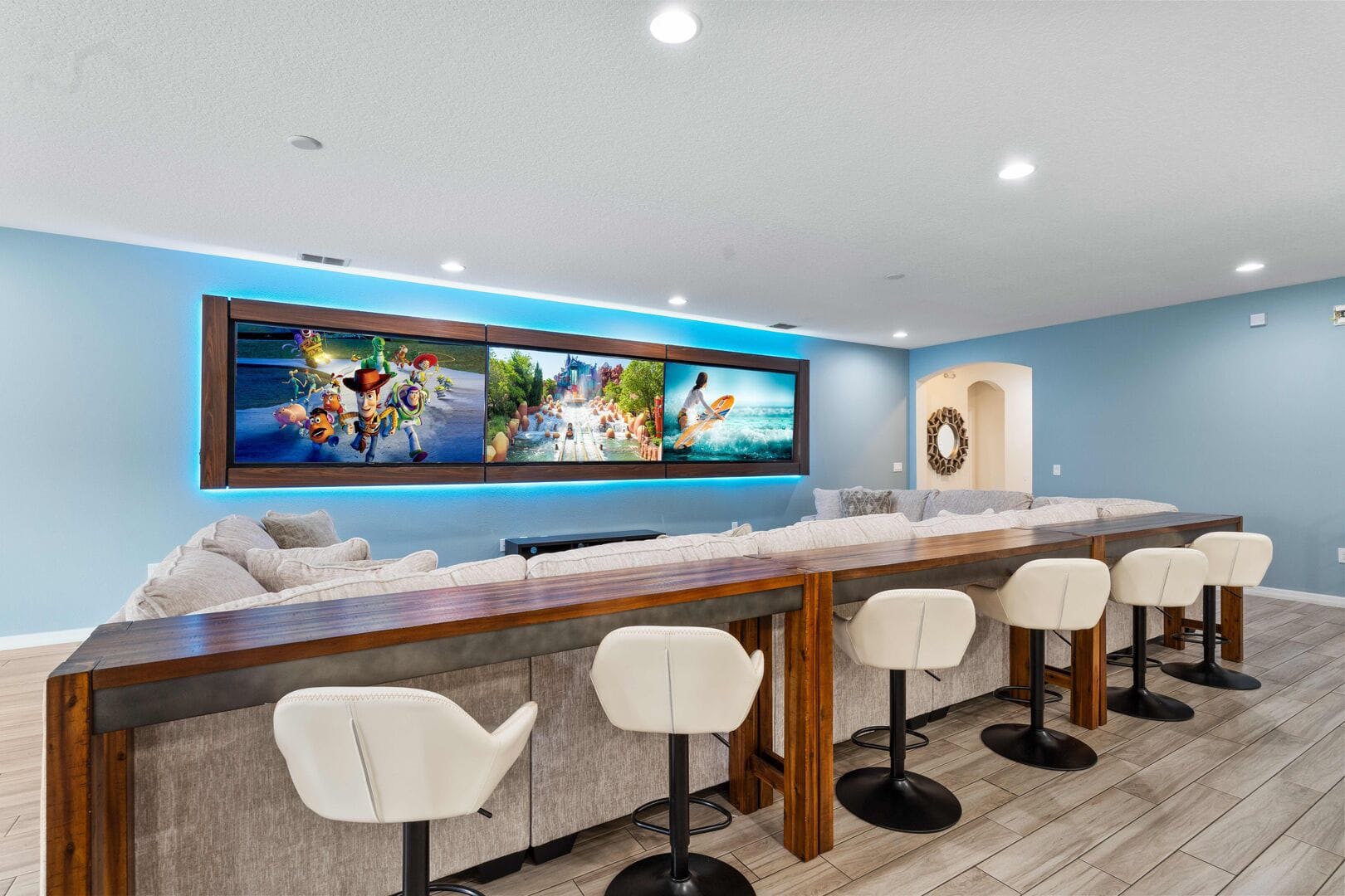 Home theater room with bar stools