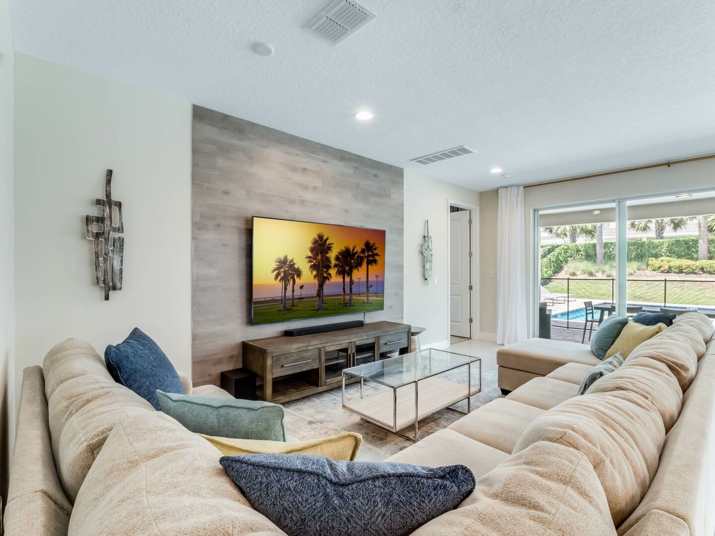 Spacious living room with television.