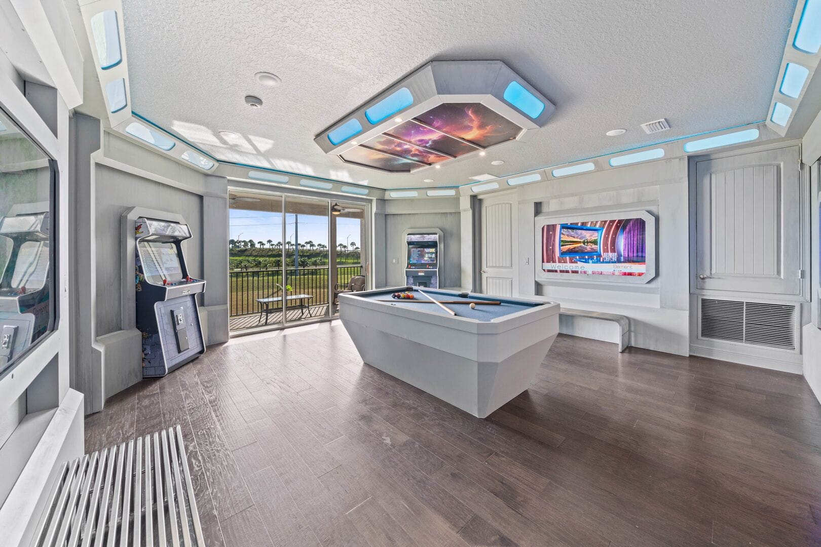 Modern game room with pool table.