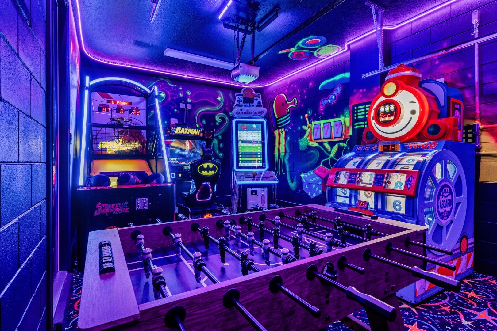 Neon-lit arcade room with games